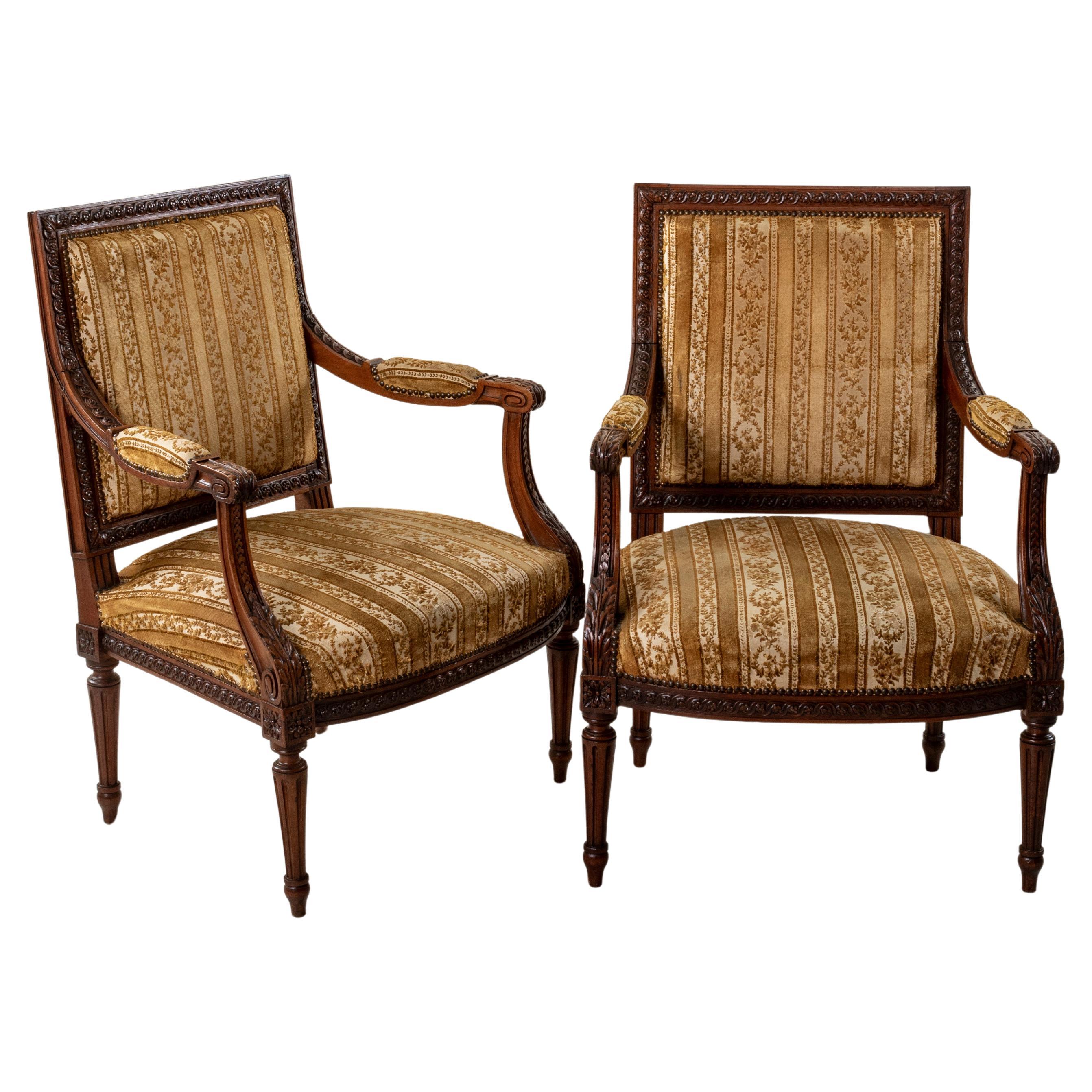 Pair of Late 19th Century French Louis XVI Style Hand Carved Walnut Armchairs For Sale