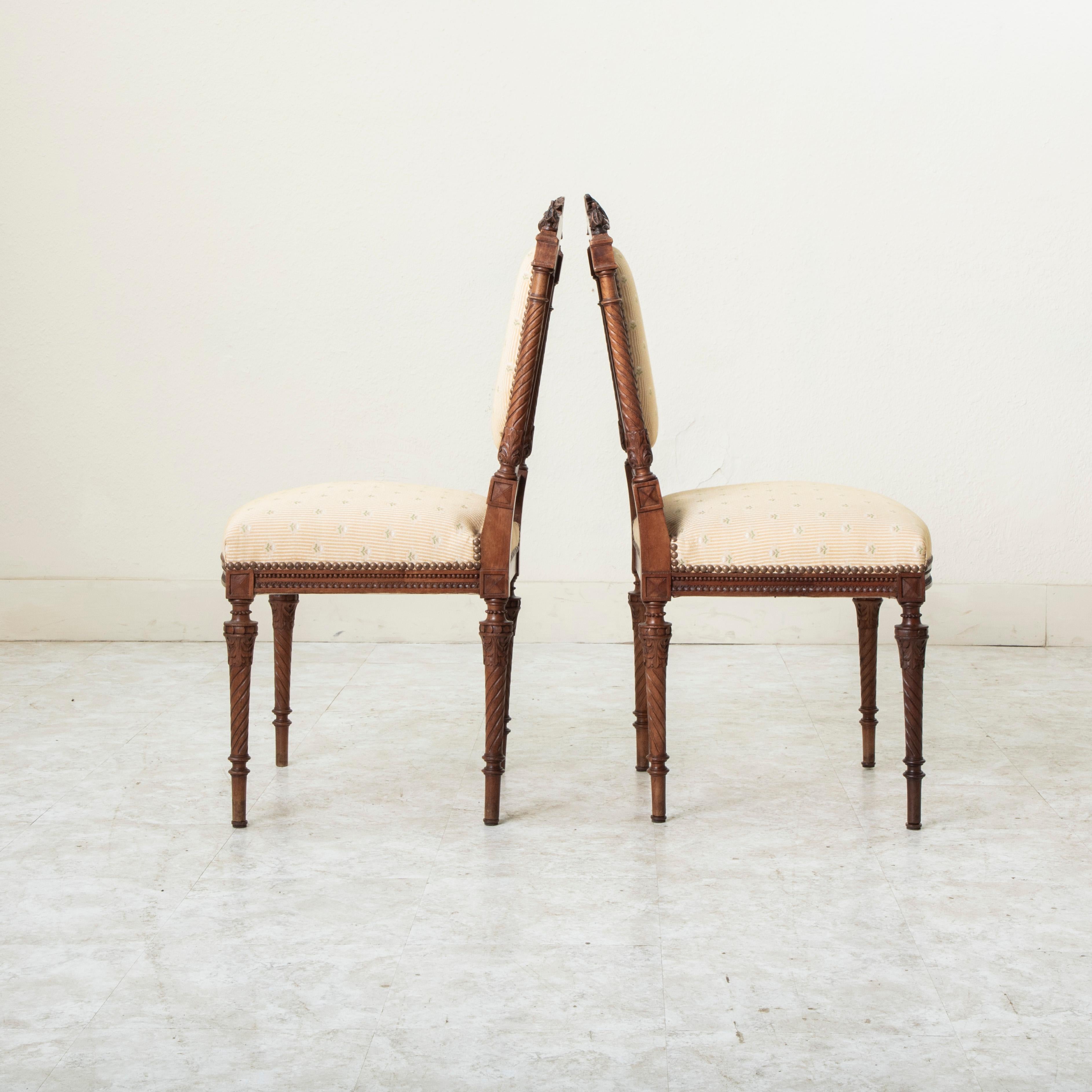 Pair of Late 19th Century French Louis XVI Style Hand Carved Walnut Side Chairs For Sale 1
