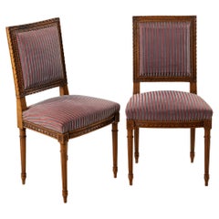 Pair of Late 19th Century French Louis XVI Style Hand Carved Walnut Side Chairs