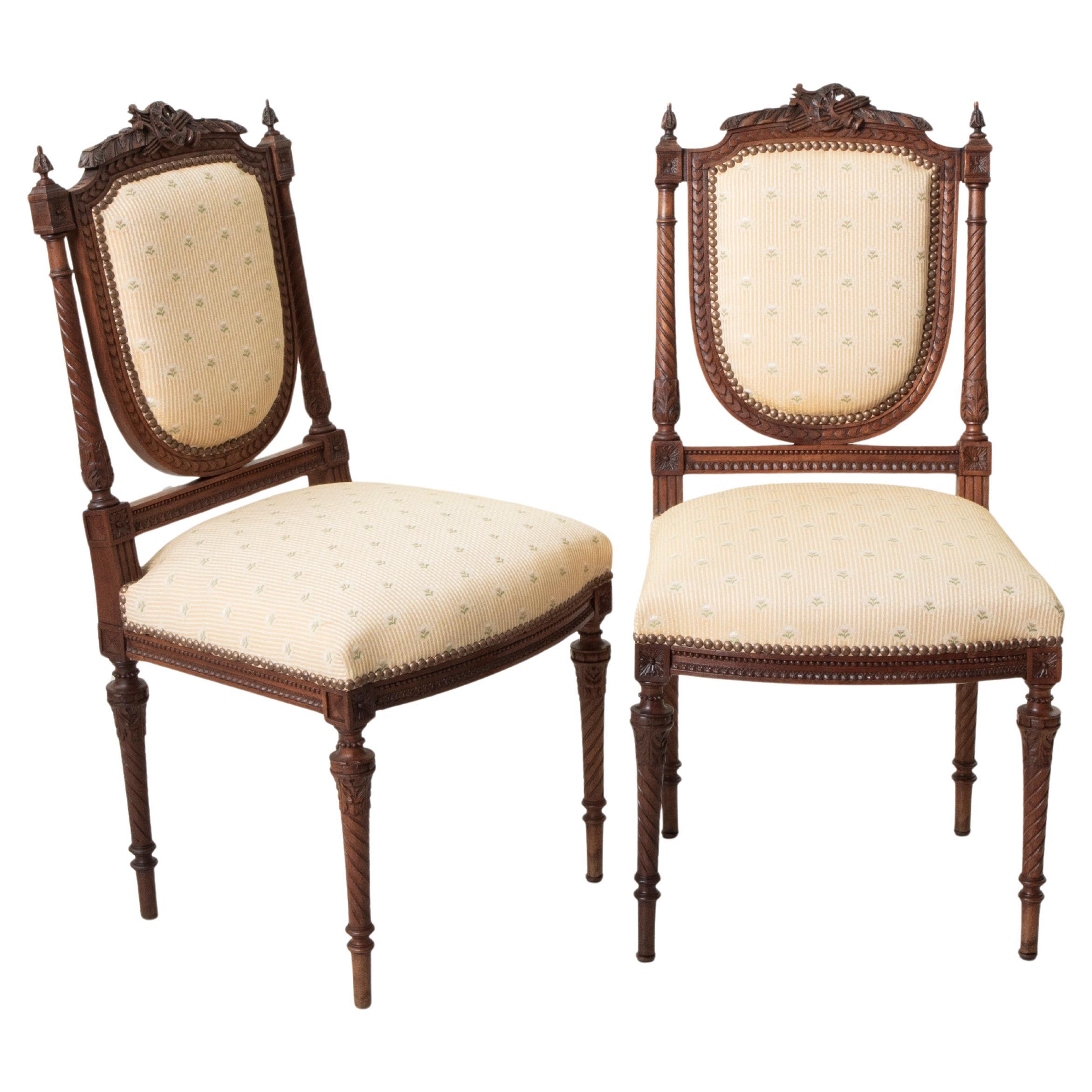 Pair of Late 19th Century French Louis XVI Style Hand Carved Walnut Side Chairs