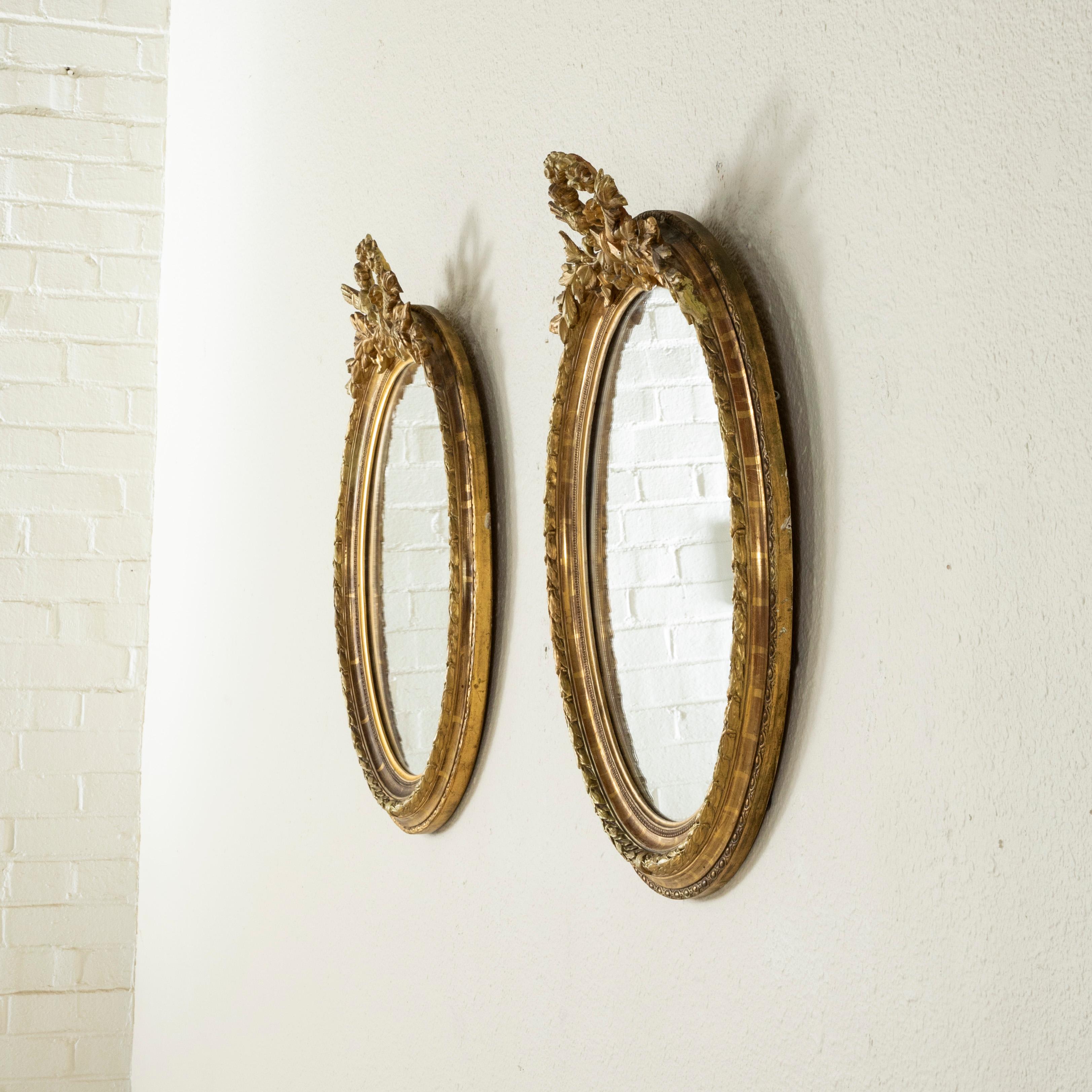Pair of Late 19th Century French Louis XVI Style Oval Gilt Wood Mirrors  In Good Condition In Fayetteville, AR