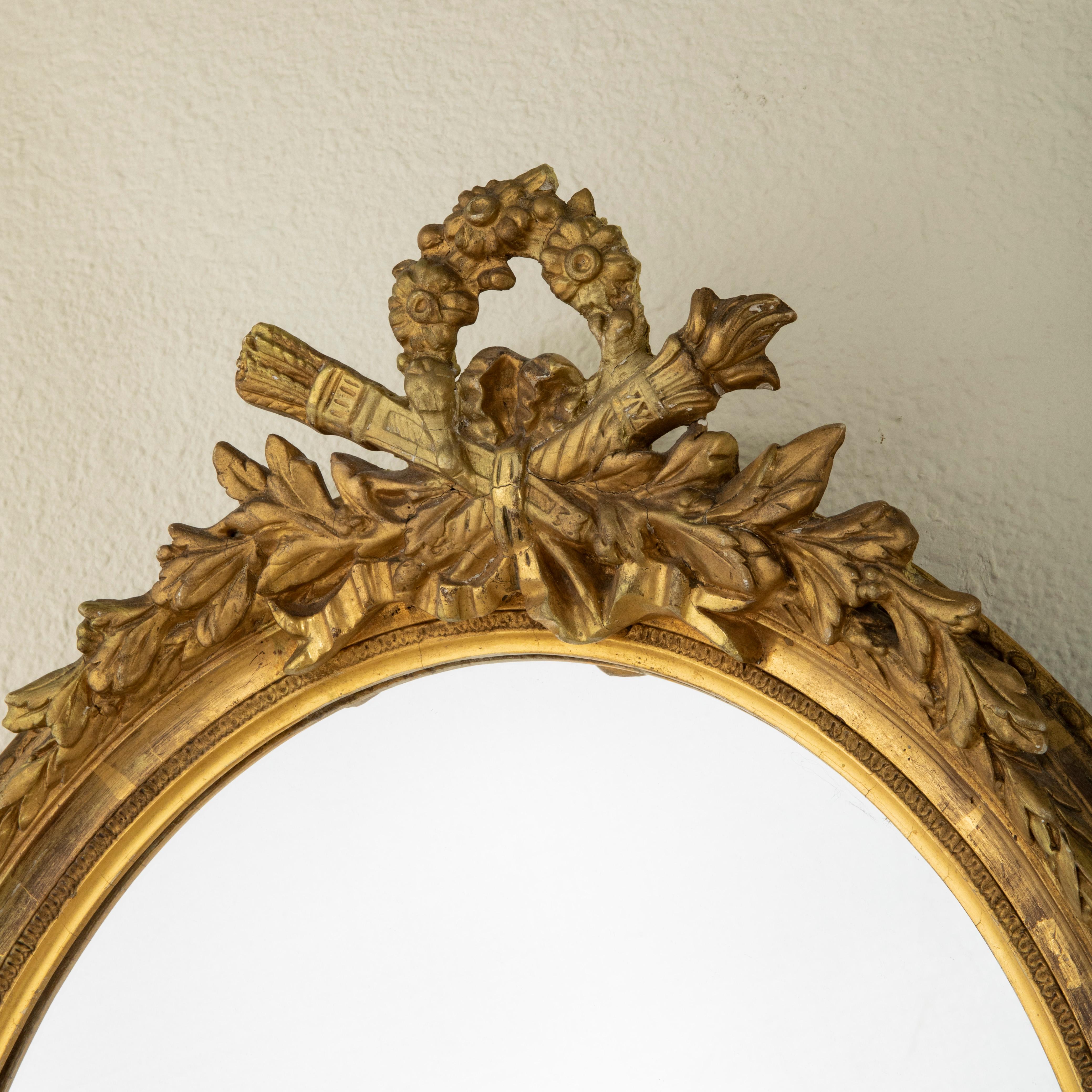 Pair of Late 19th Century French Louis XVI Style Oval Gilt Wood Mirrors  1