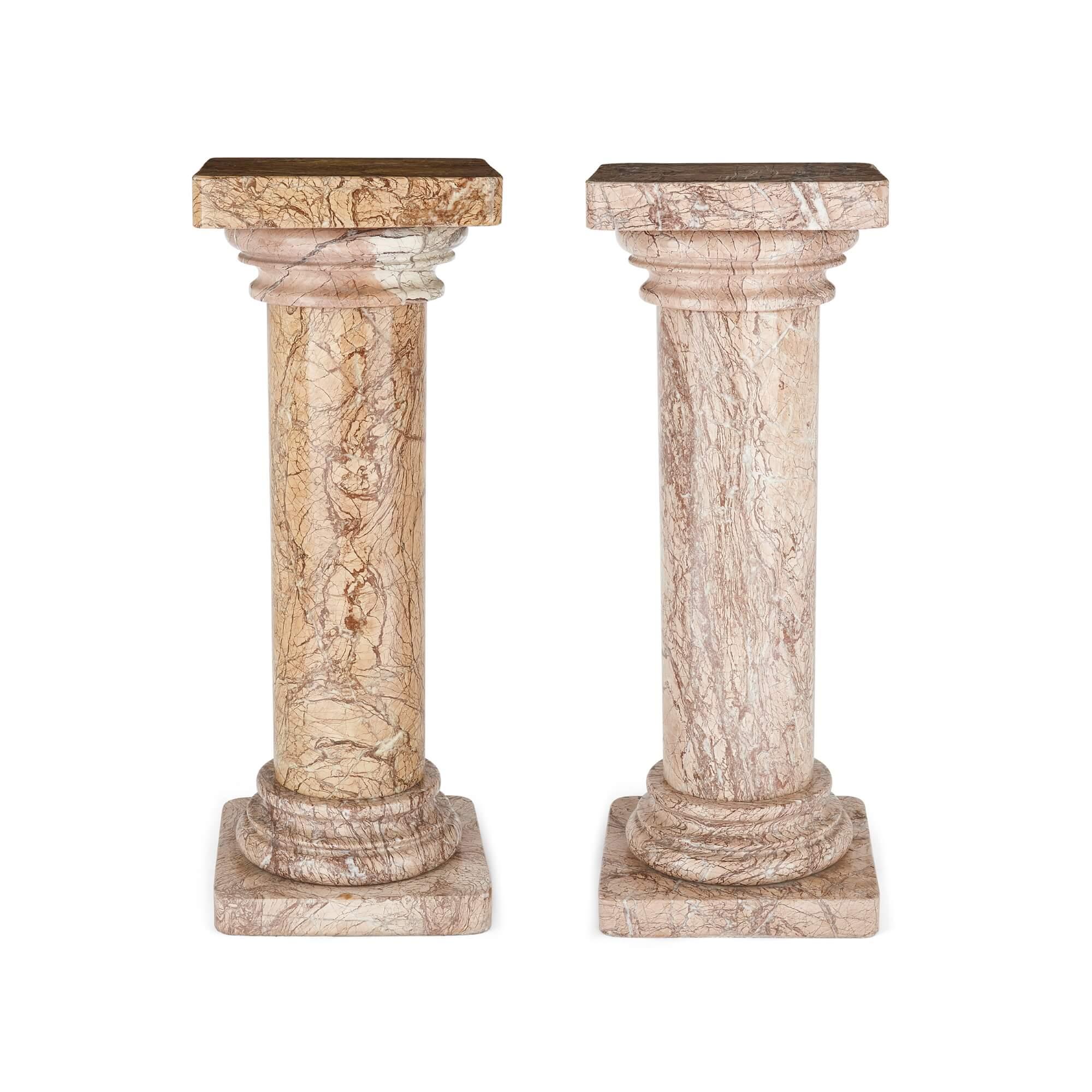 Pair of late 19th century French marble column pedestals
Measures: Height 95.5cm, width 36cm, depth 36cm

Consisting of round columns, with Tuscan-style capitals, and square mounts and bases with rounded corners, these marble pedestals are of a