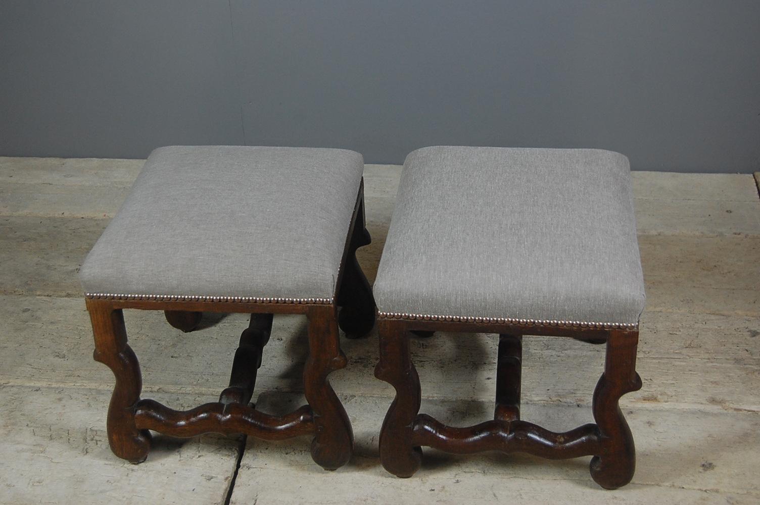 Pair of late 19th century Os de Mouton footstools, reupholstered, France, circa 1890. Priced for the pair.
