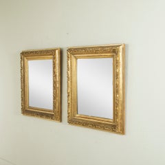 Coppia di specchi da parete in legno dorato in stile Restaurazione francese della fine del XIX secolo