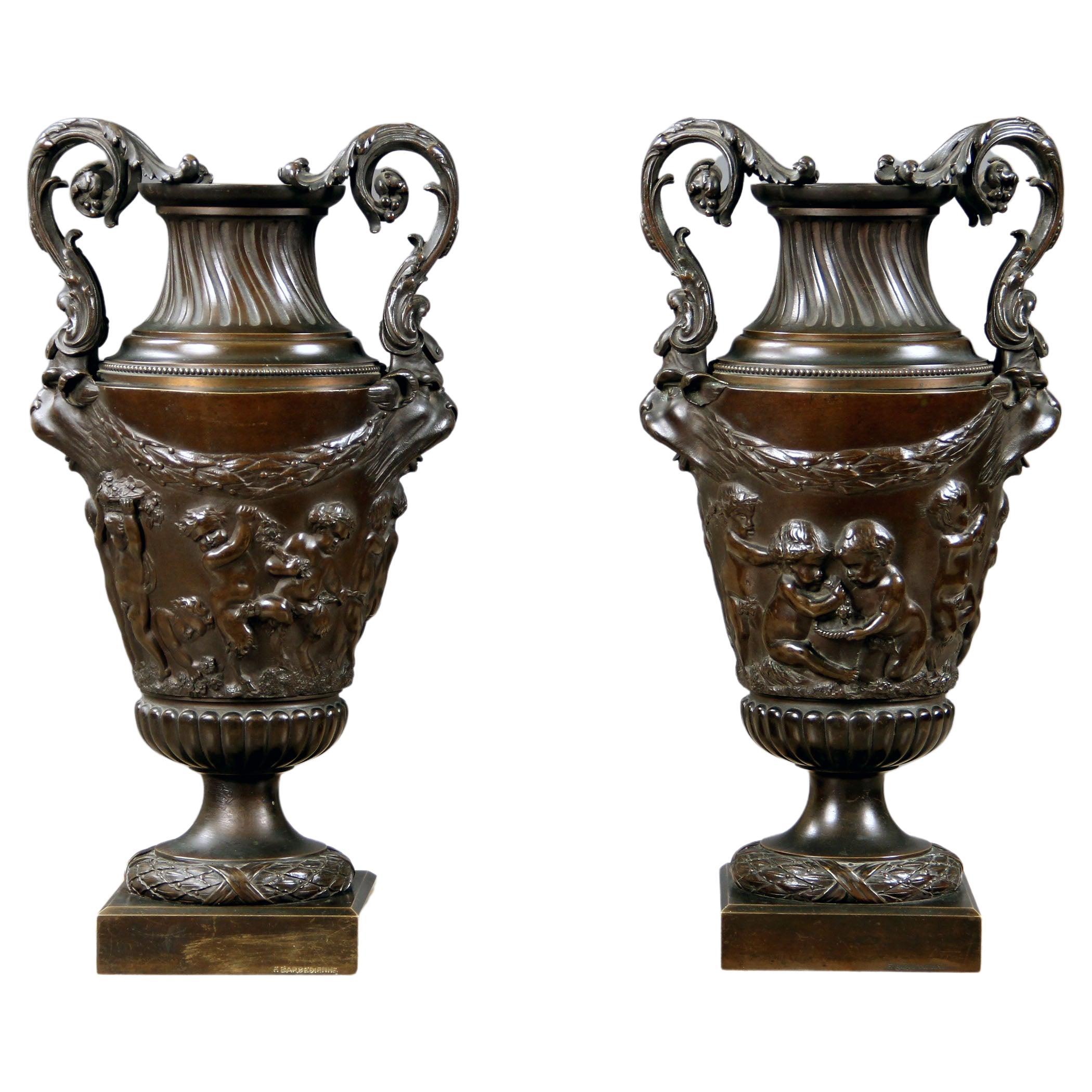 Pair of Late 19th Century Gilt and Patinated Bronze Vases After Clodion For Sale