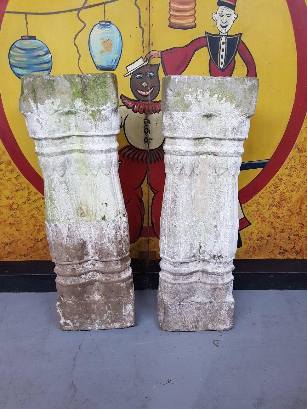 A pair of 2 handcut sandstone pillars in the form of two pillars standing together and with remains of old white painted, late 19th century.

The measurements are,
Depth 11 cm/ 4.3 inch.
Width 24 cm/ 9.4 inch.
Height 77 cm/ 30.3 inch.