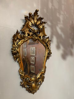 Pair of Late 19th Century Italian Carved Gilt-wood Mirrors