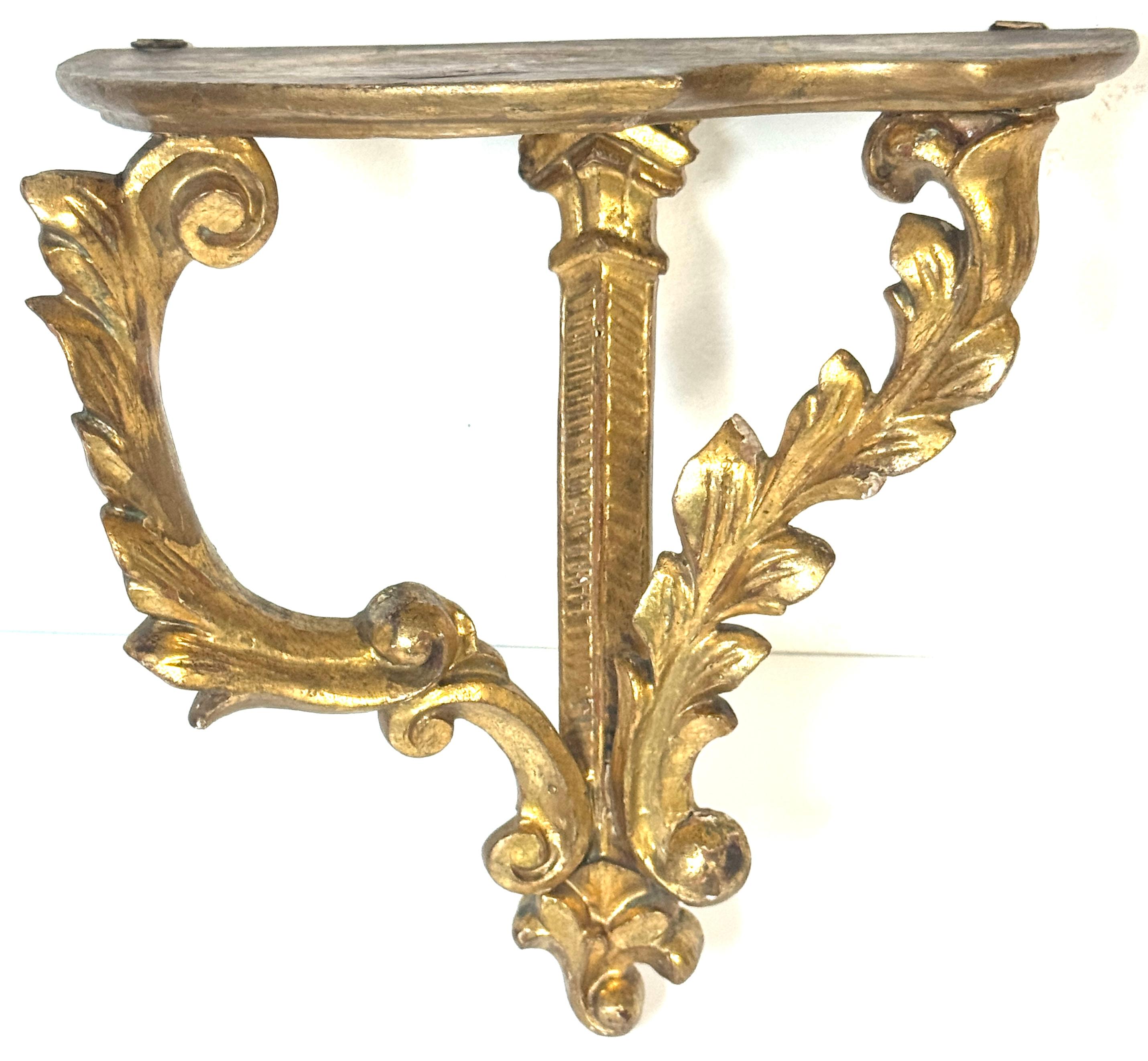 Gesso Pair of Late 19th Century Italian Carved Giltwood Neoclassical Wall Brackets For Sale