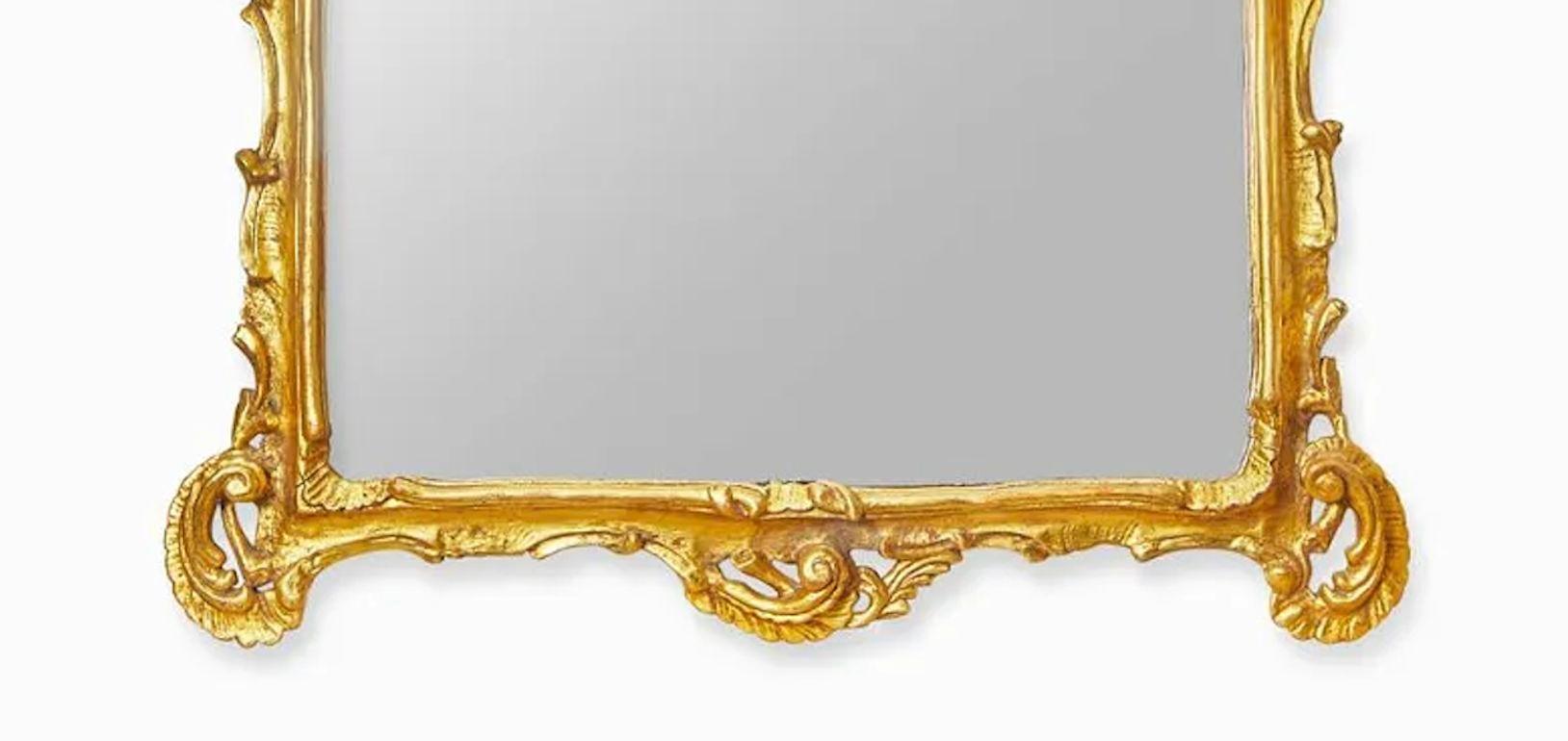 A pair of impressive Italian Rococo giltwood mirrors from the late 19th century. Great foliate hand-carved details.
Dimensions:
59