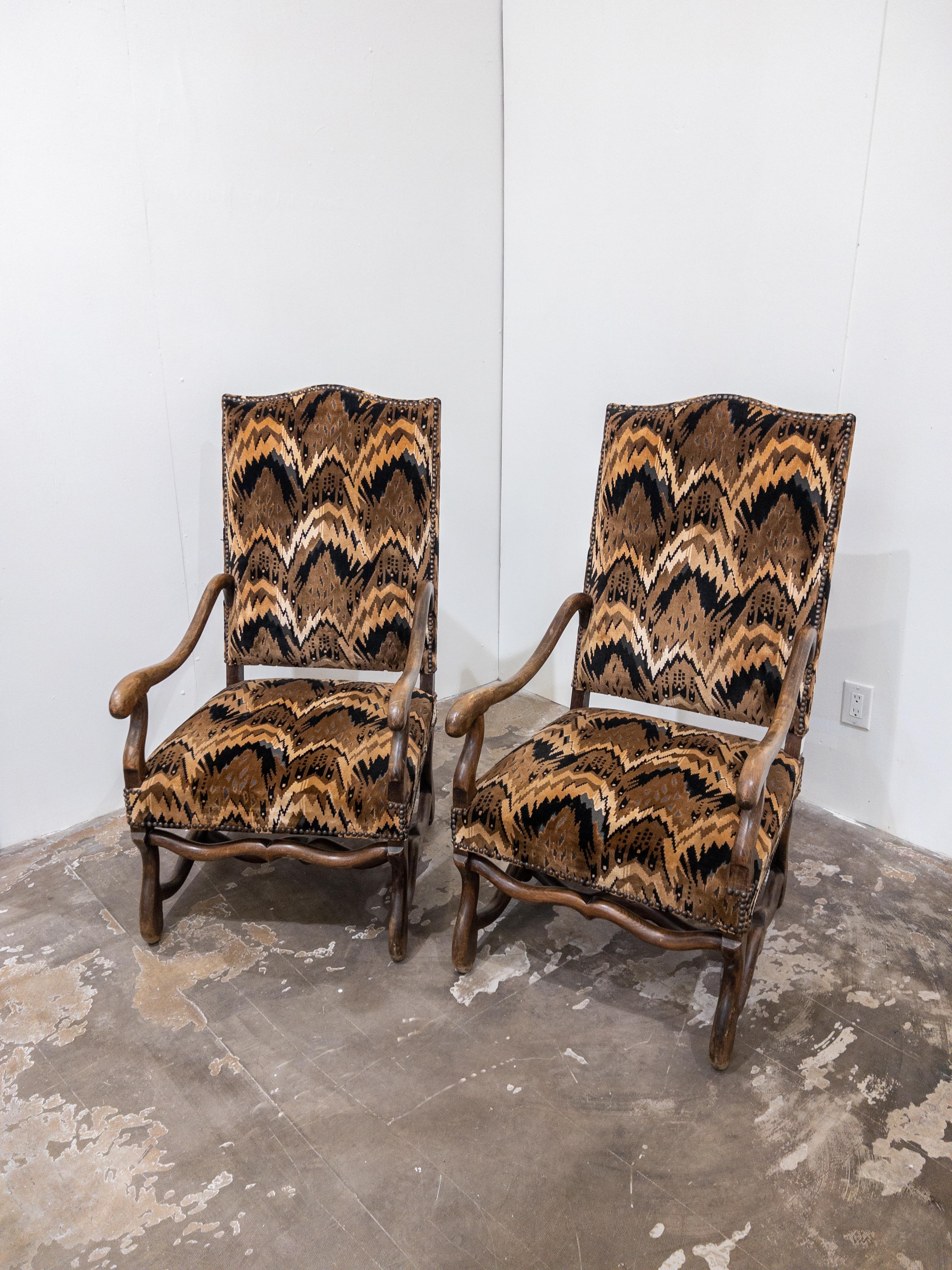 Pair of Late 19th Century Louis XIII Style Mouton Arm Chairs.
Exquisite and timeless, this pair of late 19th-century Louis XIII style mouton arm chairs epitomizes sophistication and elegance. Crafted with meticulous artistry, the chairs showcase a