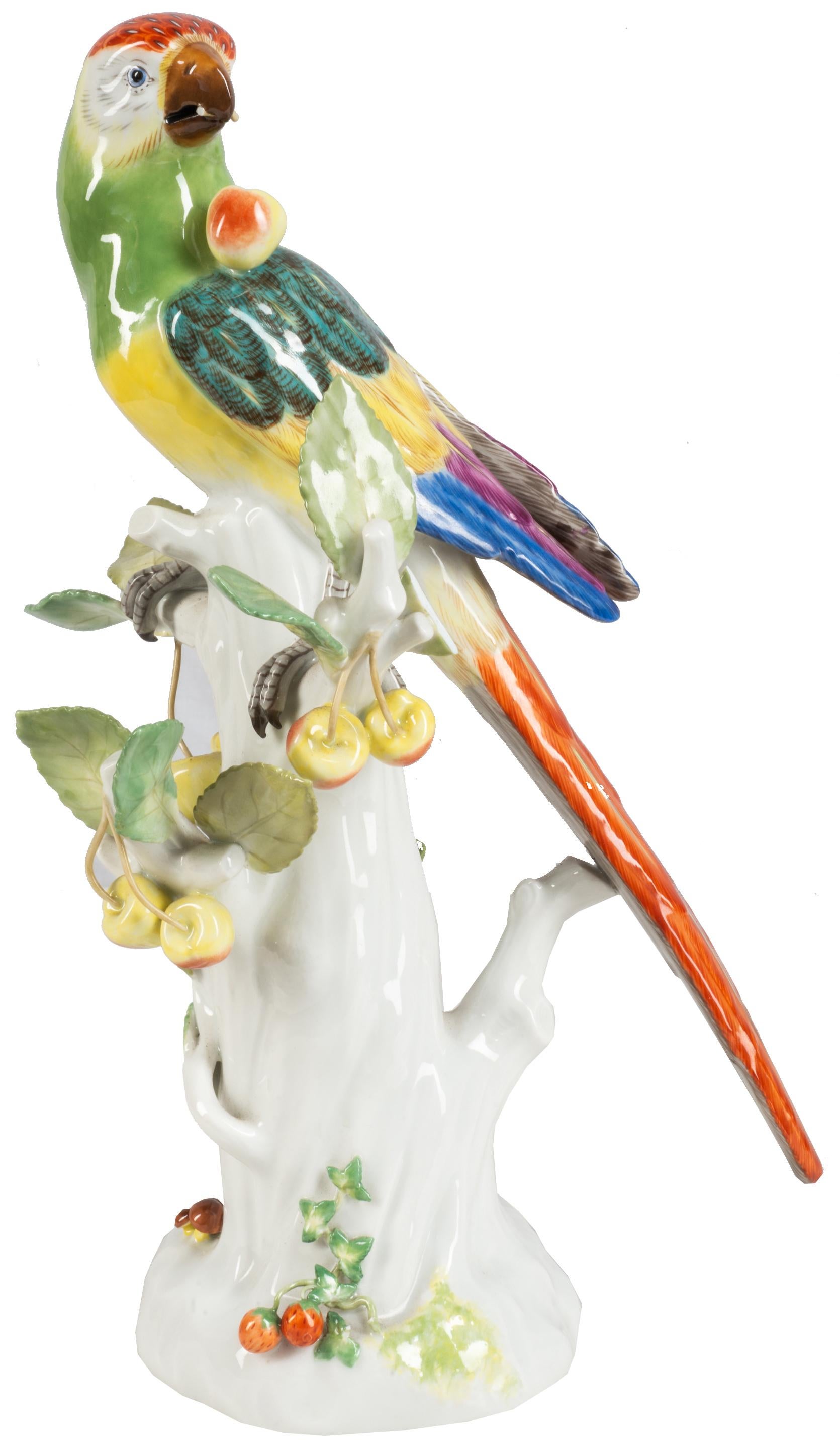 Avery good quality pair of late 19th century German Meissen porcelain parrots perched on tree trunks, each of wonderful vibrant colors.
Blue crossed swords mark to bases.