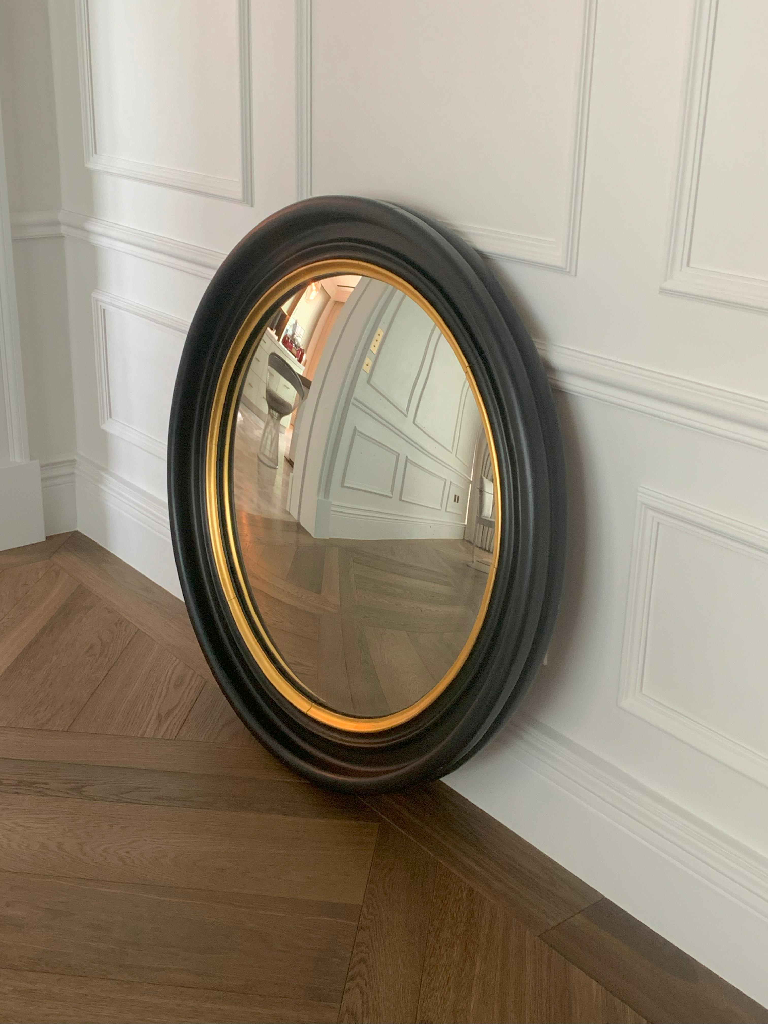 Pair of Late 19th Century Regency Revival Black and Giltwood Convex Mirrors In Good Condition For Sale In Glasgow, GB