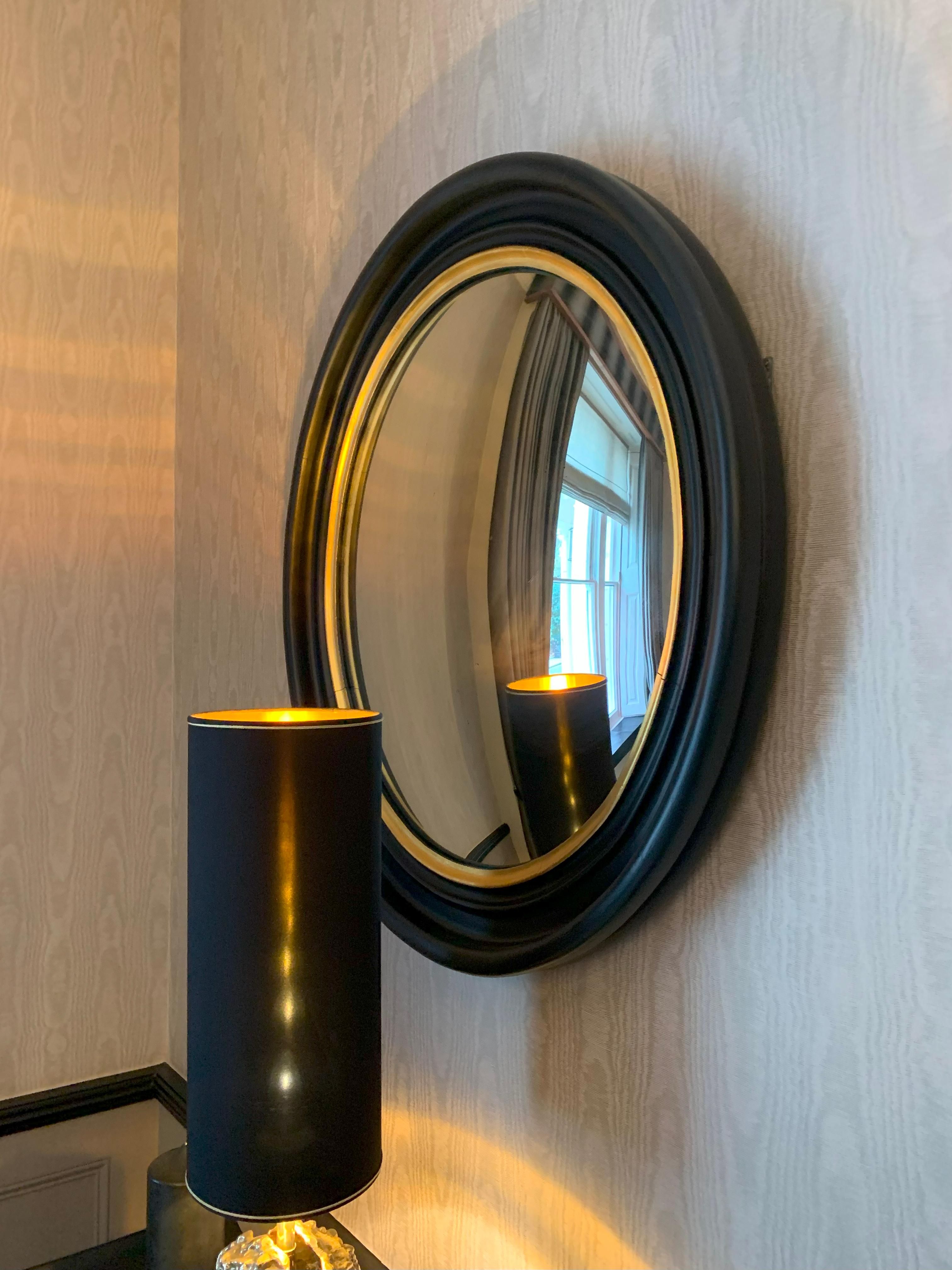 Pair of Late 19th Century Regency Revival Black and Giltwood Convex Mirrors For Sale 2
