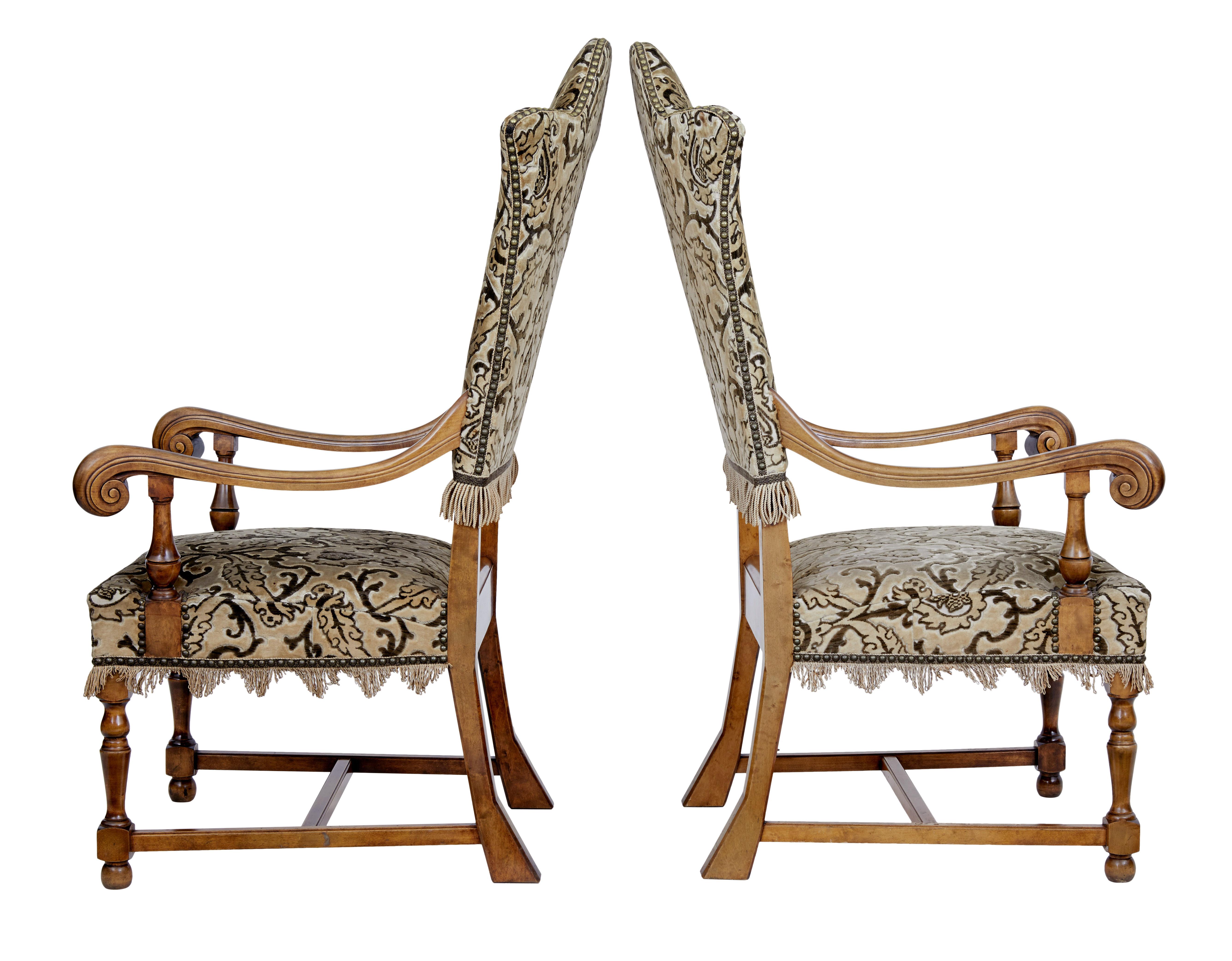 Pair of late 19th century shaped birch armchairs, circa 1890.

Elegant pair of late 19th century Swedish birch throne armchairs. A real striking pair of chairs with the shaped backs and carved scrolling arms.

Standing on front turned legs and