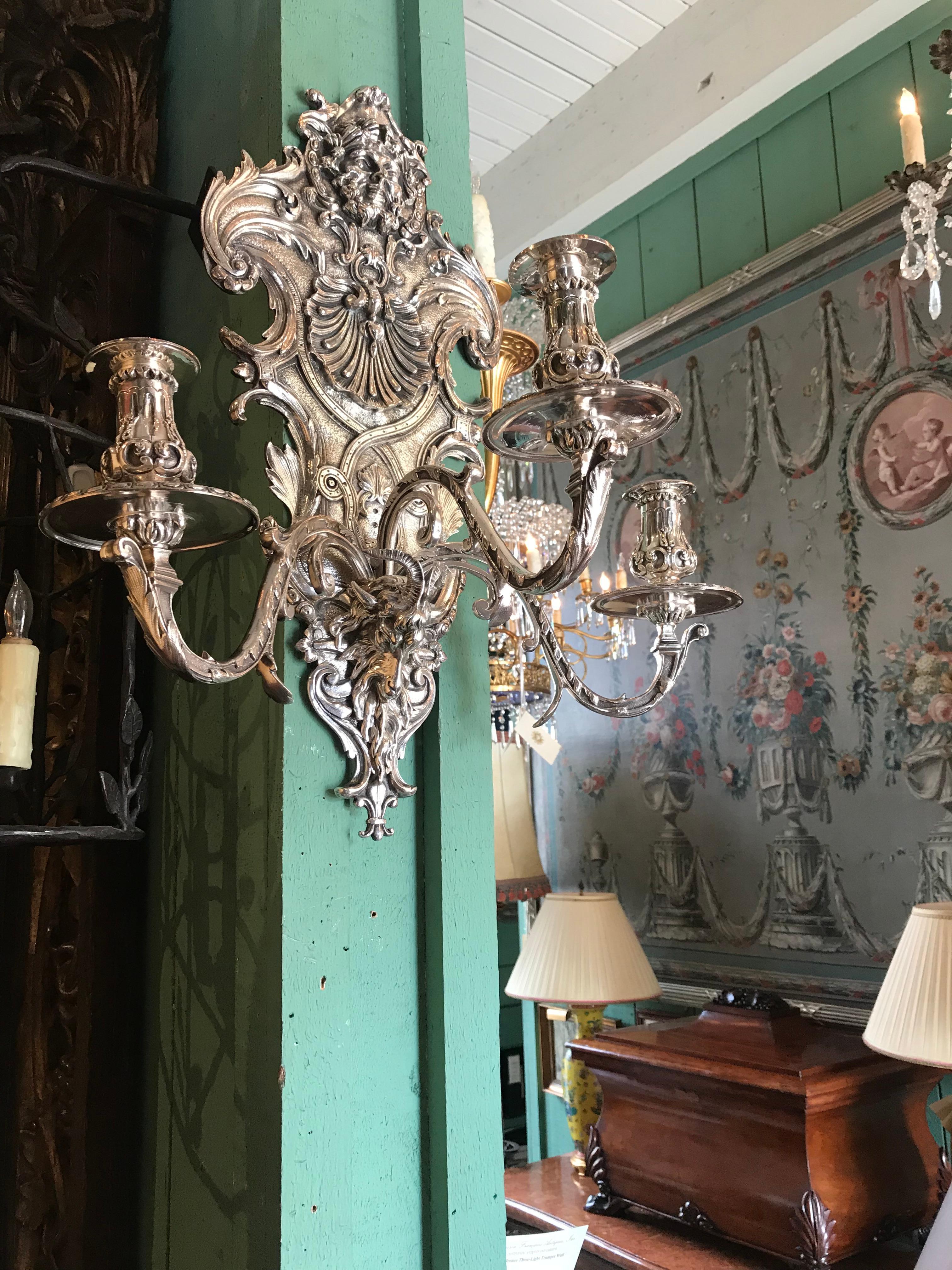 High end pair of late 19th century silver plated Louis XIV style 3-light wall sconces.
It's a beautiful pair of decorative wall light, to add elegance and the magic of the old world charm to any room.
Bedroom  hallway  living room dining room or