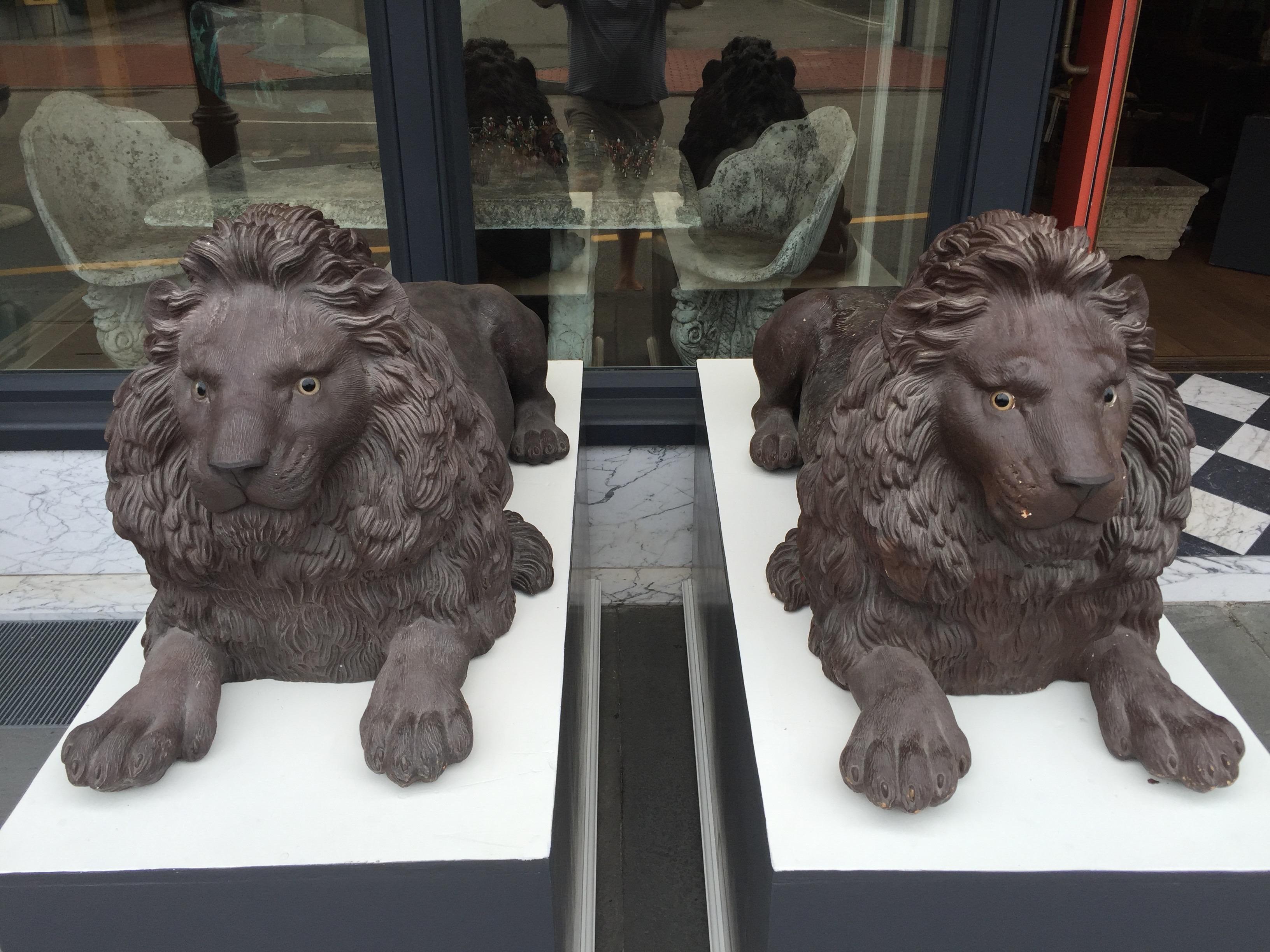European Pair of Late 19th Century Terracotta Lions in Resting Pose For Sale