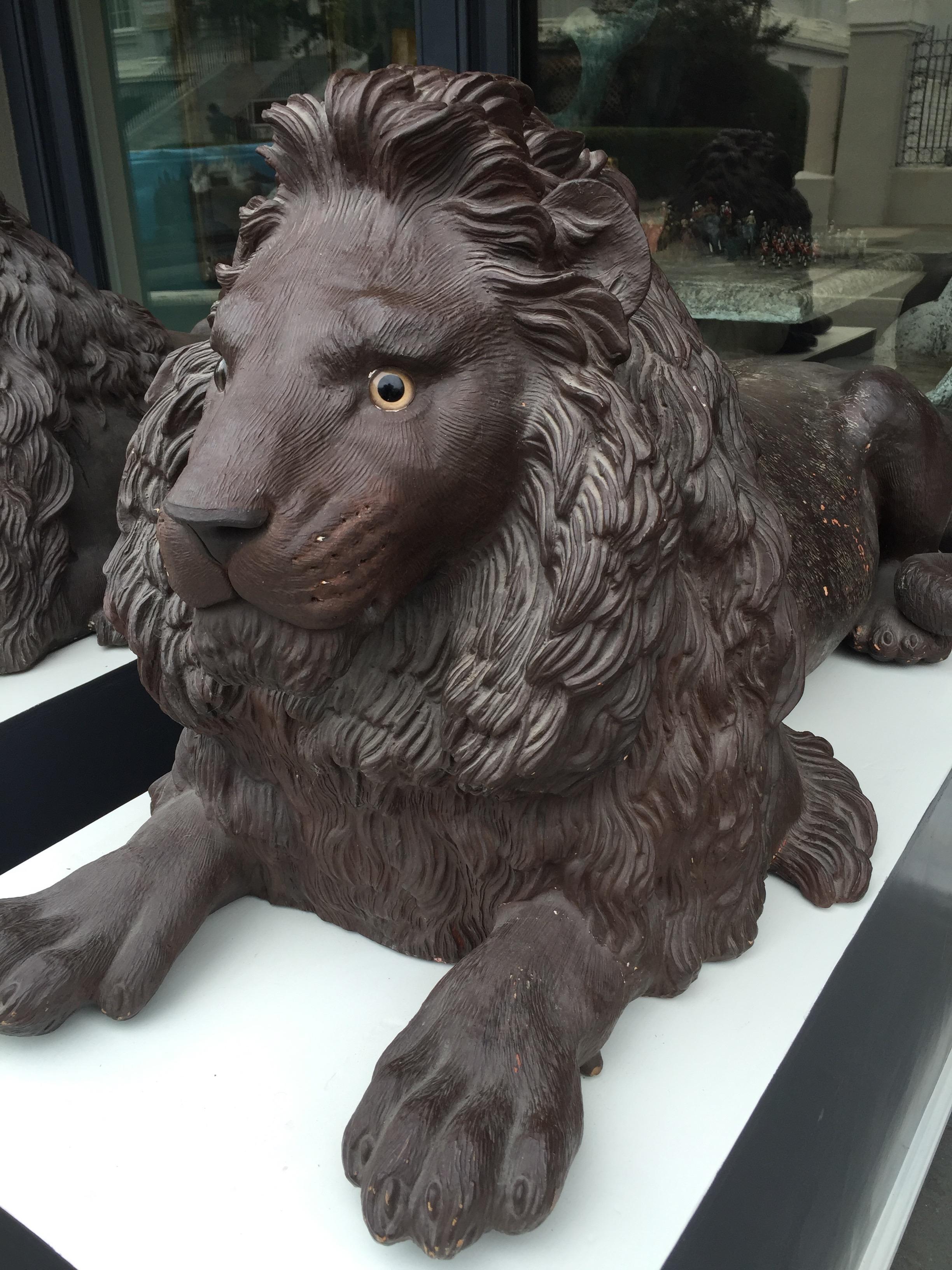 Pair of Late 19th Century Terracotta Lions in Resting Pose In Excellent Condition For Sale In Charleston, SC