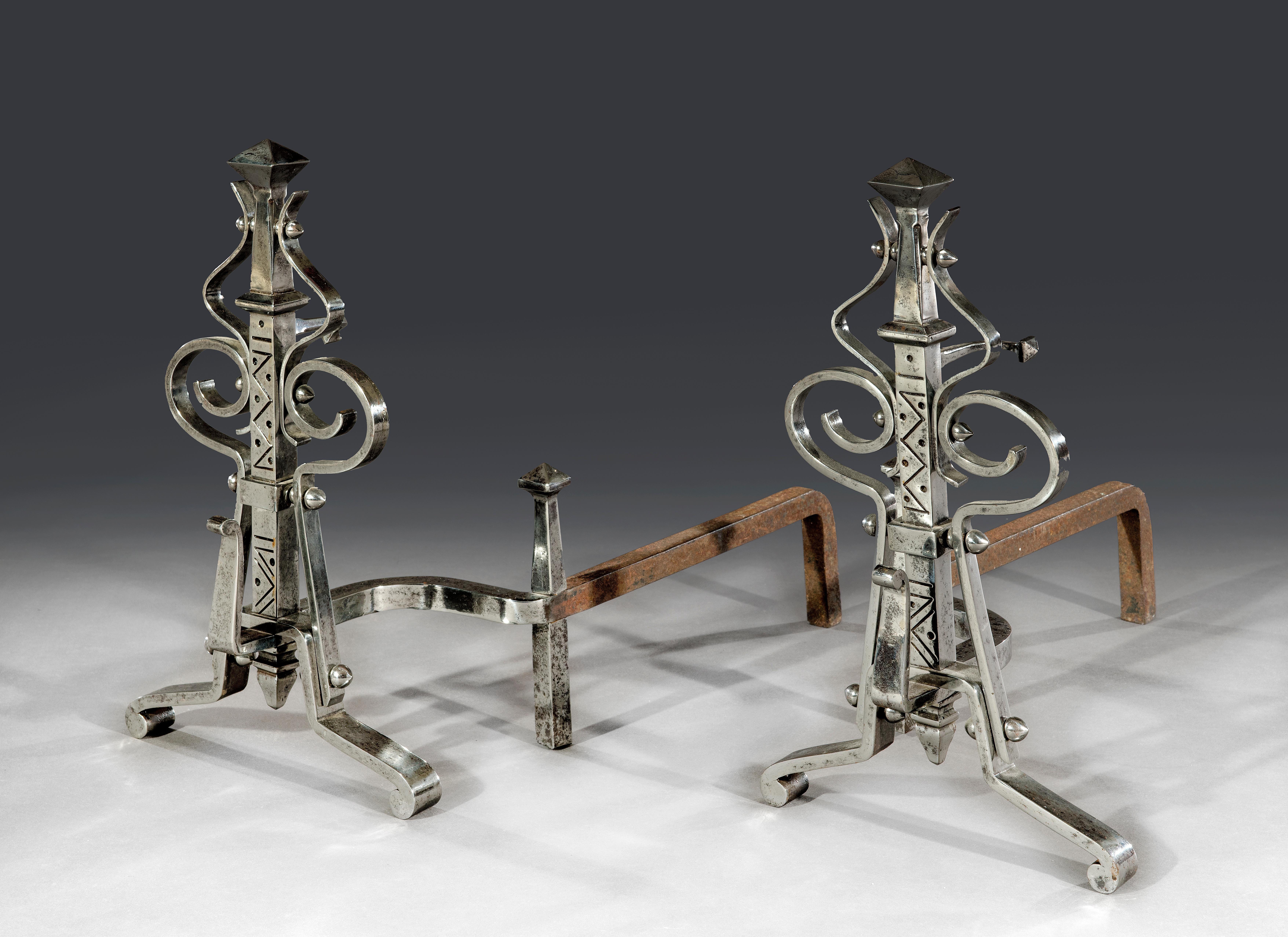 The polished steel andirons have fine 'punching' and wrought-work through-out.