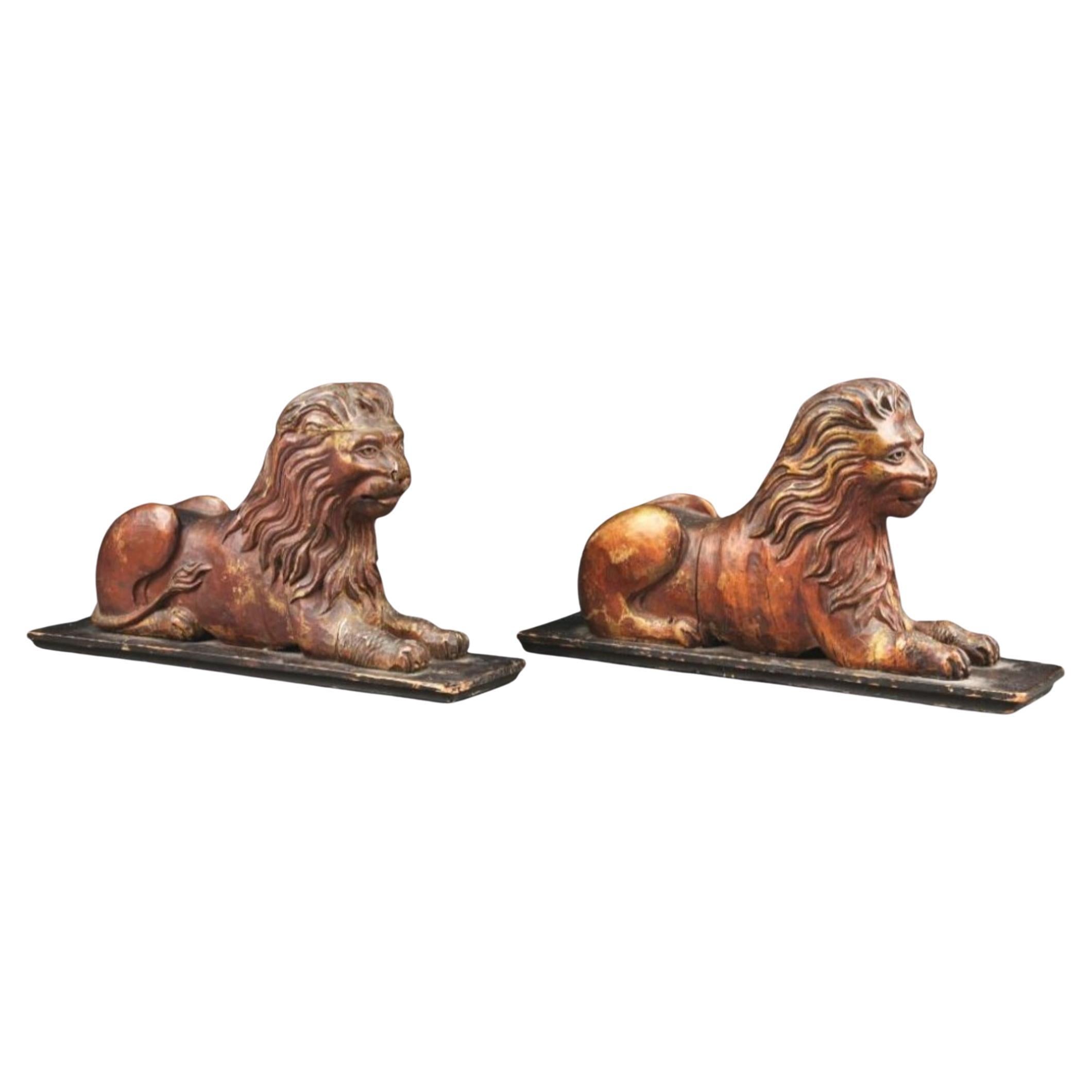 Pair of Late 19th Century Wood and Gilt Lions from Asia