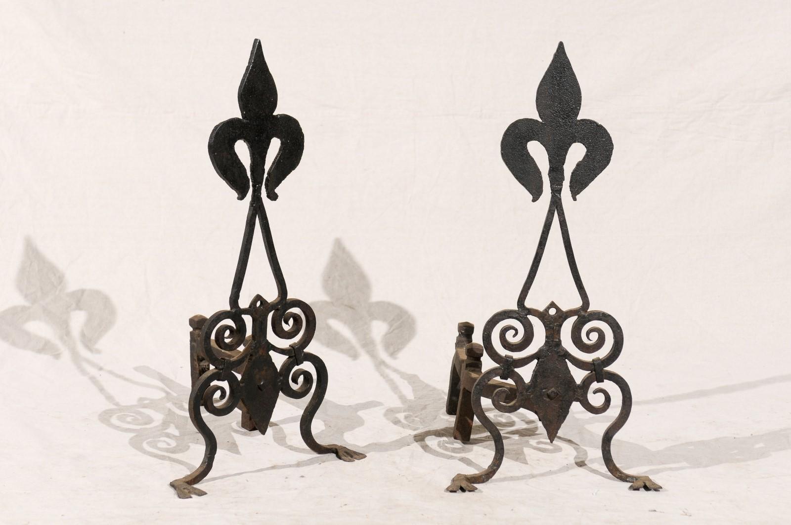 Pair of late 19th-early 20th century American black Fleur-de-Lis andirons
whimsical / naive.
