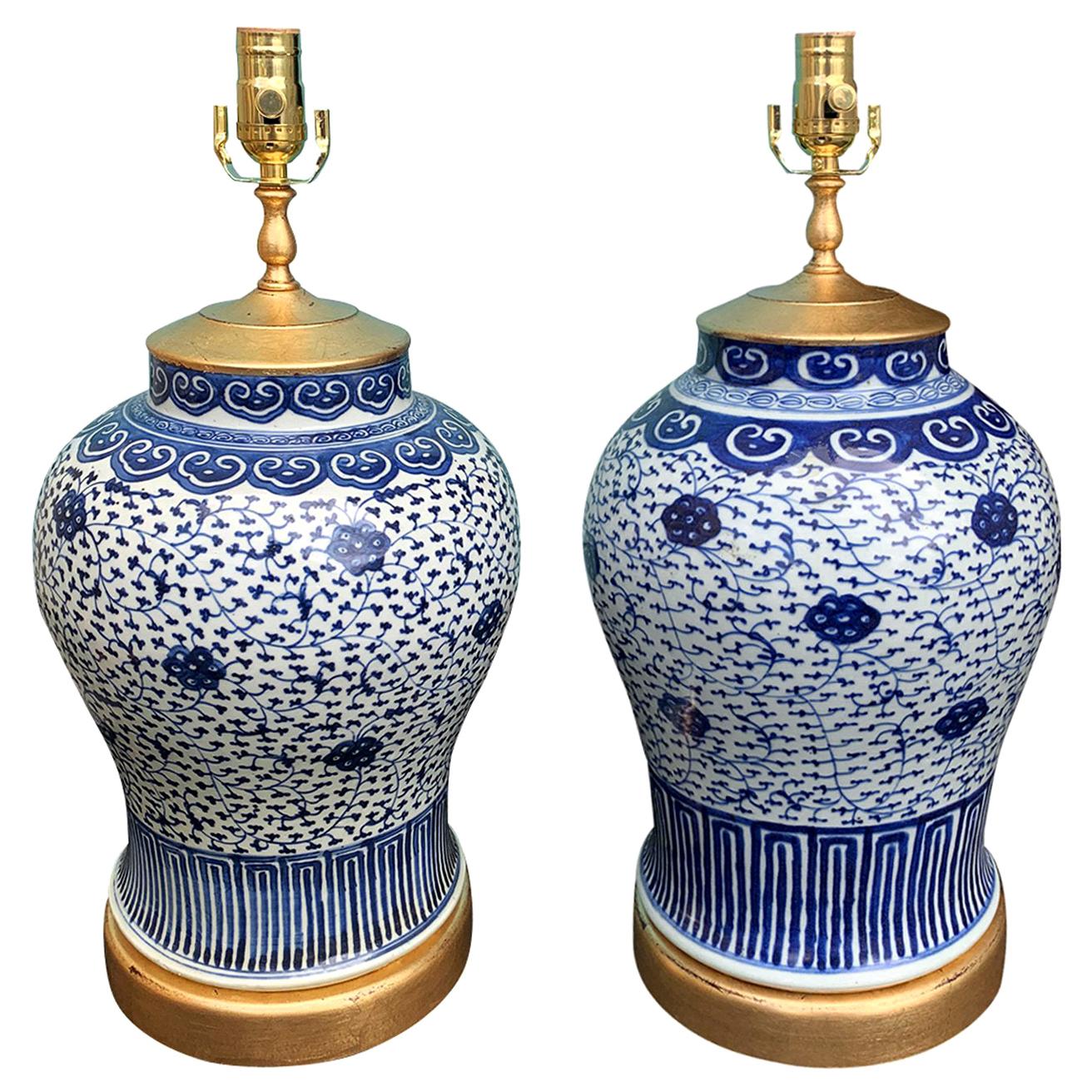 Pair of Late 19th-Early 20th Century Blue & White Vases as Lamps, Giltwood Bases