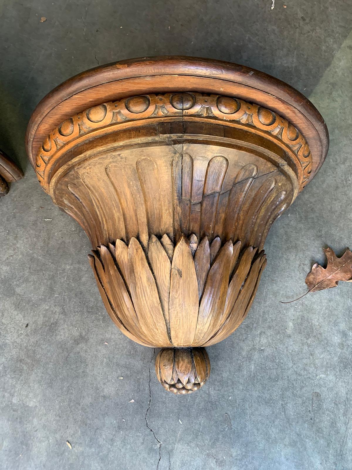 Pair of large scale late 19th-early 20th century Continental hand carved demilune brackets.