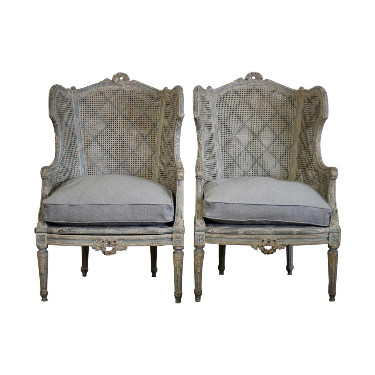 Pair of Late 19th-Early 20th Century French Painted Caned Bergeres For Sale