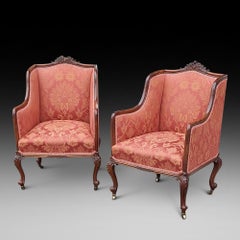 Paire de chaises de salon en acajou sculpté de la fin du XIXe siècle