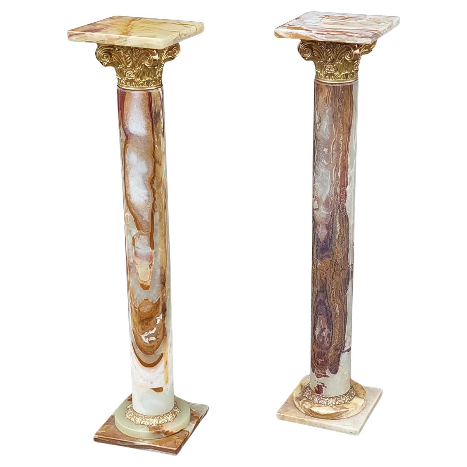 Coppia di colonne torchere in onice della fine del XIX secolo