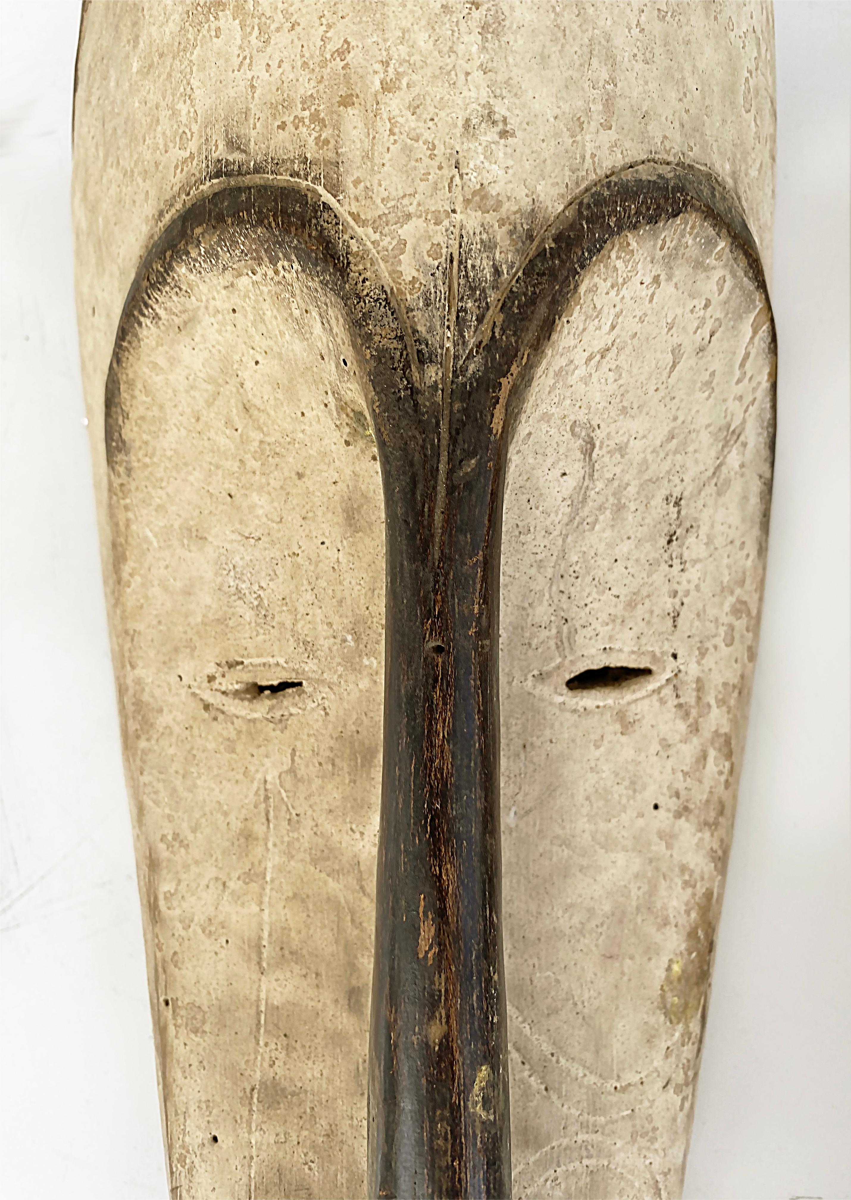 Ghanaian Pair of Late 20th Century African Carved Judicial Fang Masks For Sale