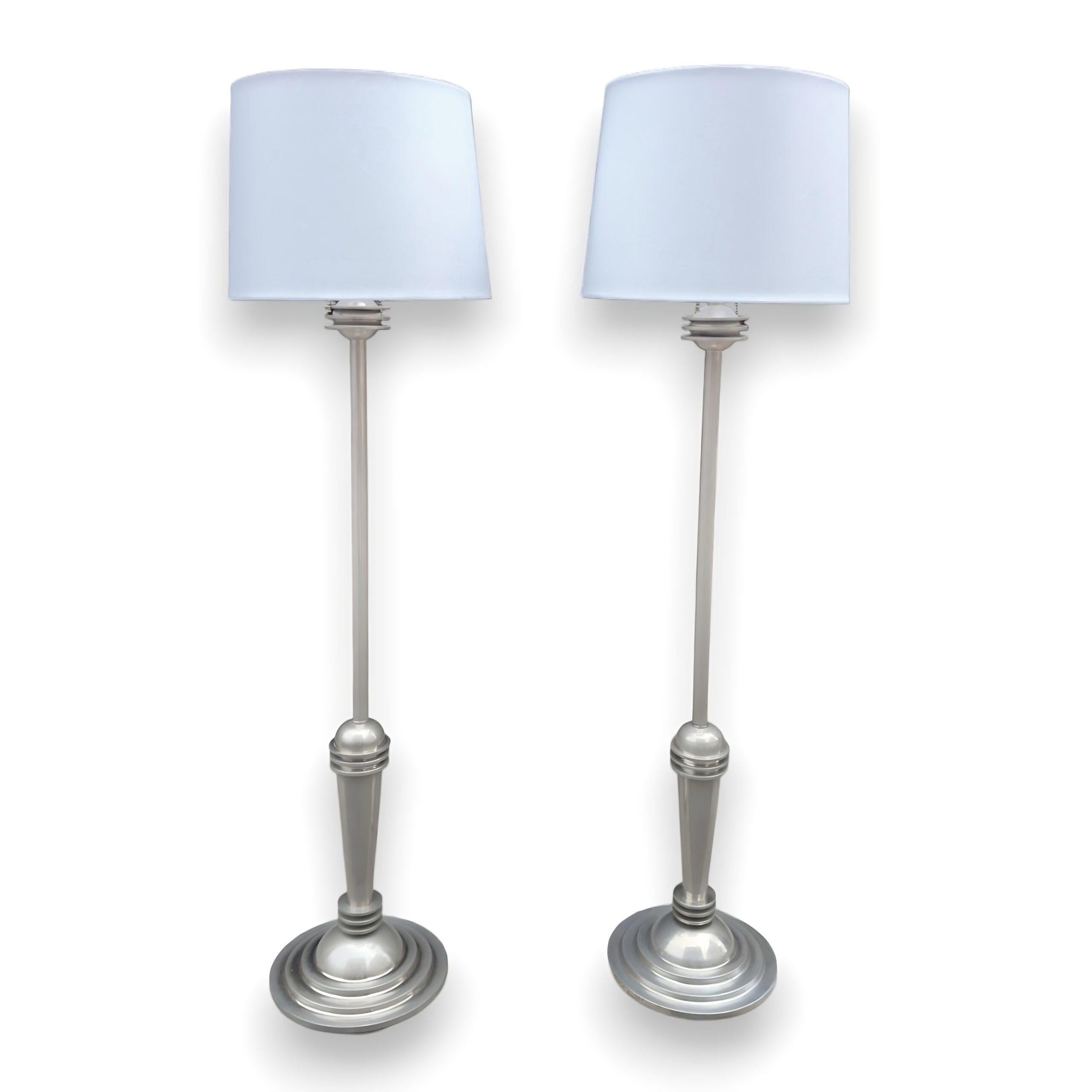 Pair of Late 20th Century Art Deco Chrome Floor Lamps by Woka Labs

Introducing a captivating pair of Art Deco floor lamps from the esteemed Woka Labs Vienna, showcasing the exquisite design and craftsmanship of the late 20th century. These twin