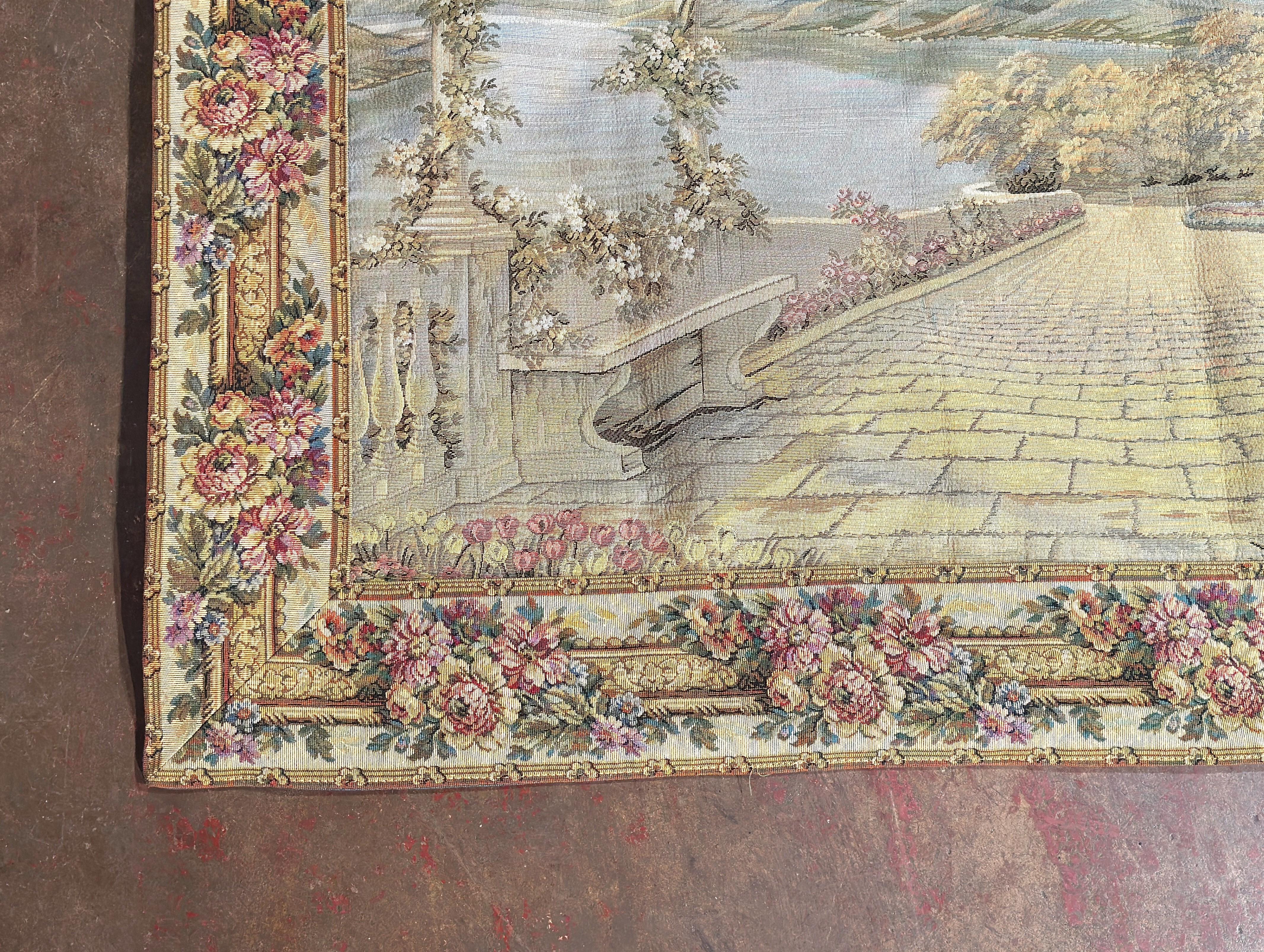 Bring color and pastoral charm to a hallway, bedroom, or stair landing with this pair of decorative French tapestry panels. Woven in Flanders circa 1980 in the Gobelins manner, each textile features a richly detailed landscape rendered in a soft,