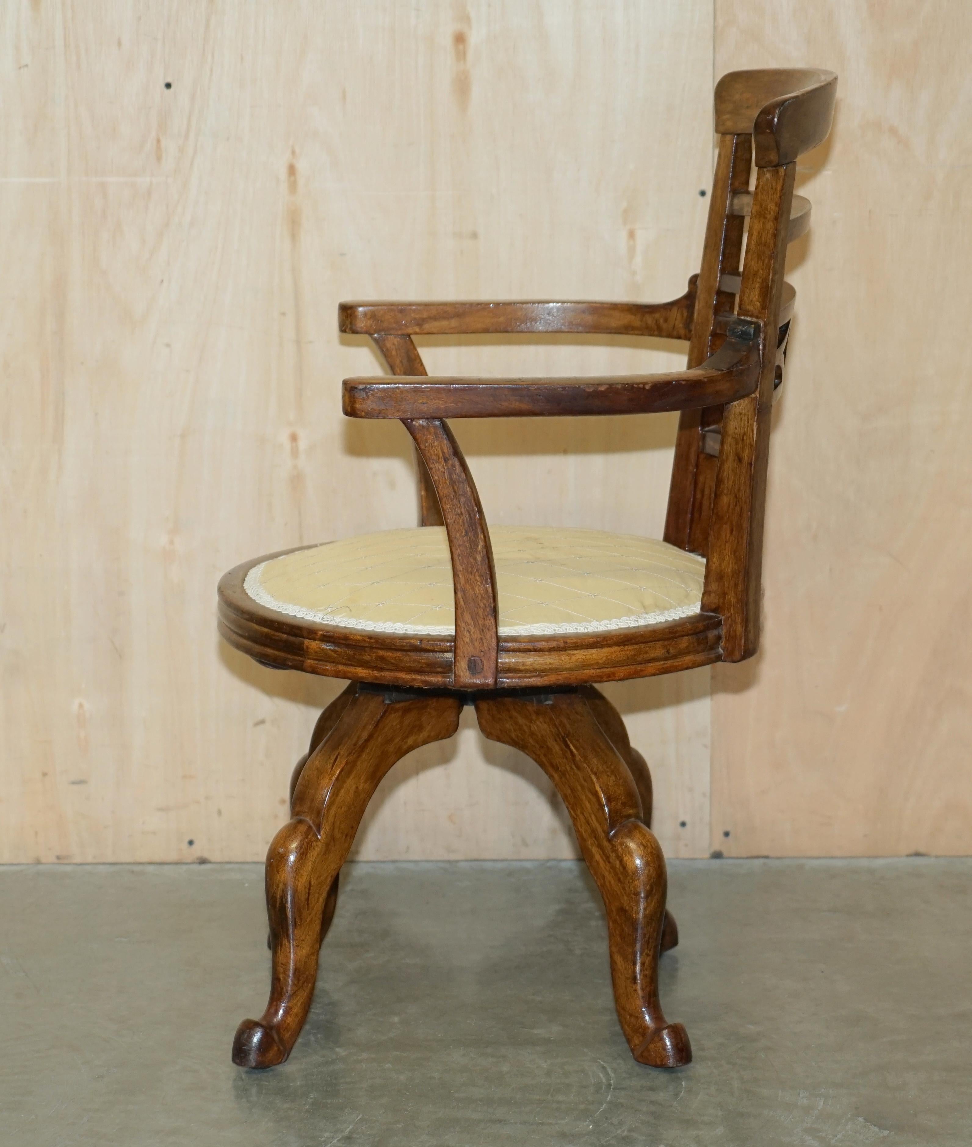 PAIR OF LATE ANTIQUE VICTORIAN WALNUT B COHEN & SON'S LTD SWIVEL CAPTAINS CHAIRs For Sale 9