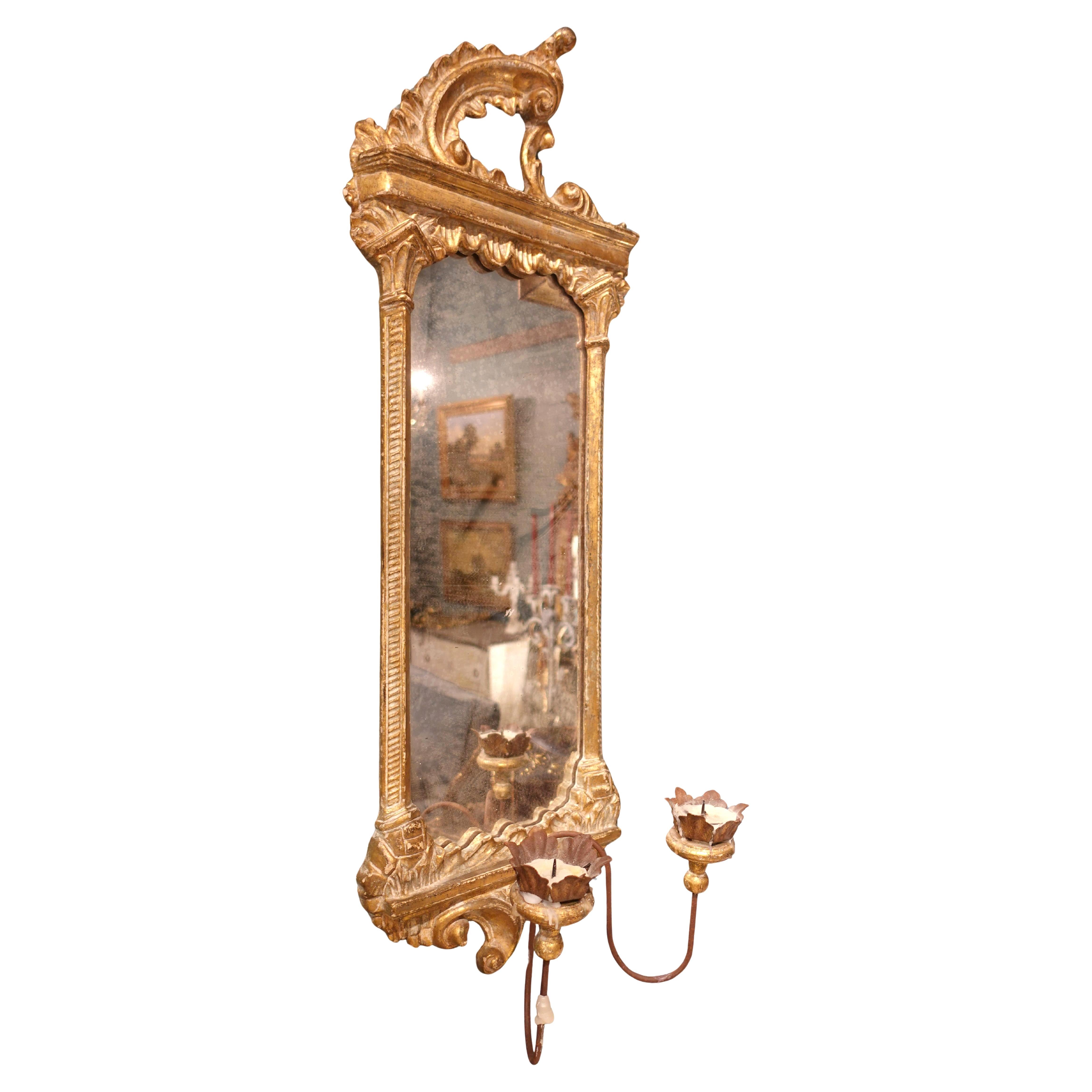 Pair of late Baroque Rococo Giltwood Mirrored Two-Candle Wall Sconces

Anonymous
Probably France; ca. 1800
Giltwood, glass, iron

Approximate size: 36.5 (h) x 14 (w) x 10 (d) in. ea.

These exquisite late Baroque giltwood mirrored wall sconces offer