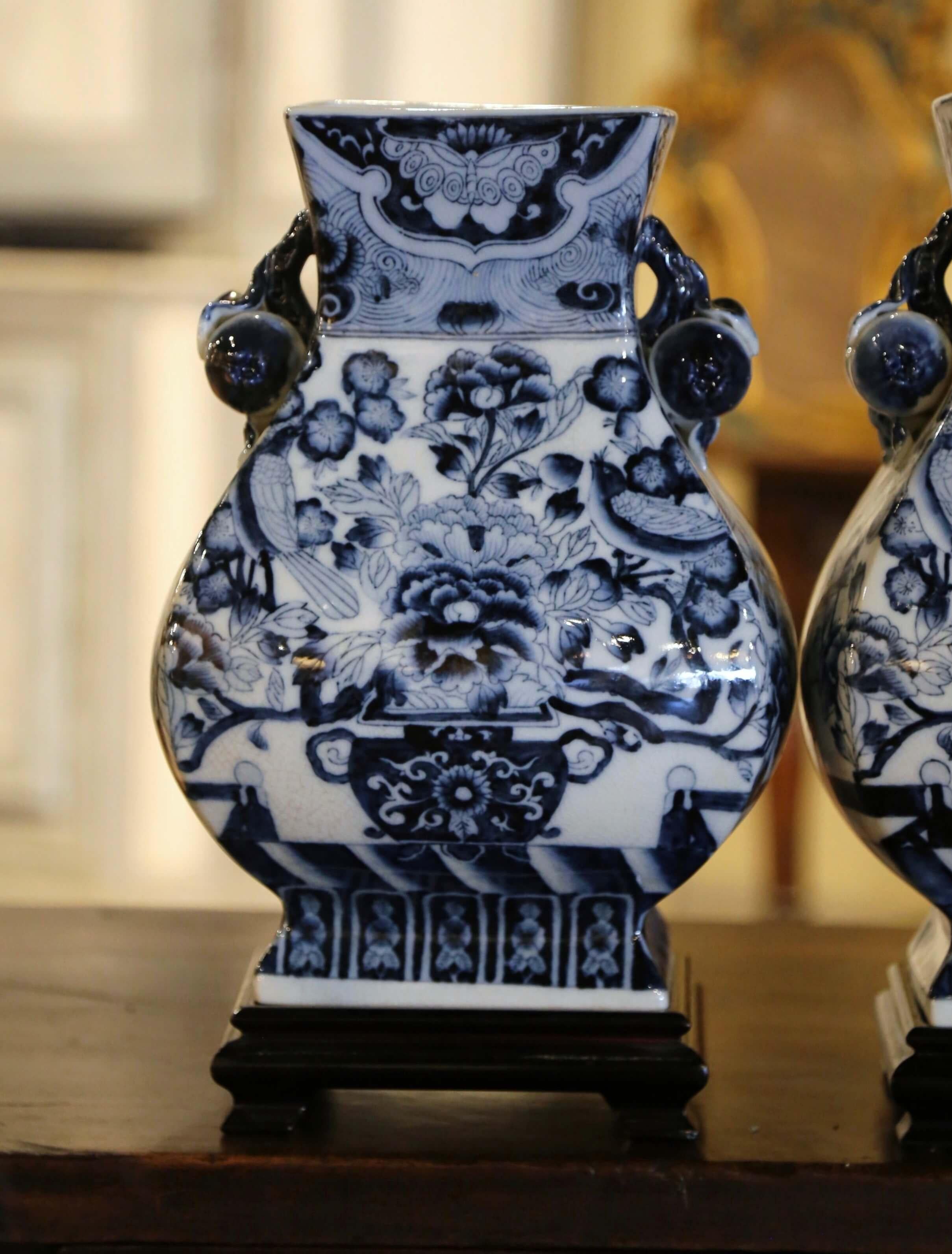 Hand-Crafted Pair of Late Century Chinese Hand Painted Blue & White Porcelain Vases on Stands
