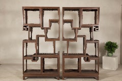 Pair of Late Qing Dynasty Brown Lacquered Display Shelves with Fretwork Motifs