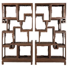 Pair of Late Qing Dynasty Brown Lacquered Display Shelves with Fretwork Motifs