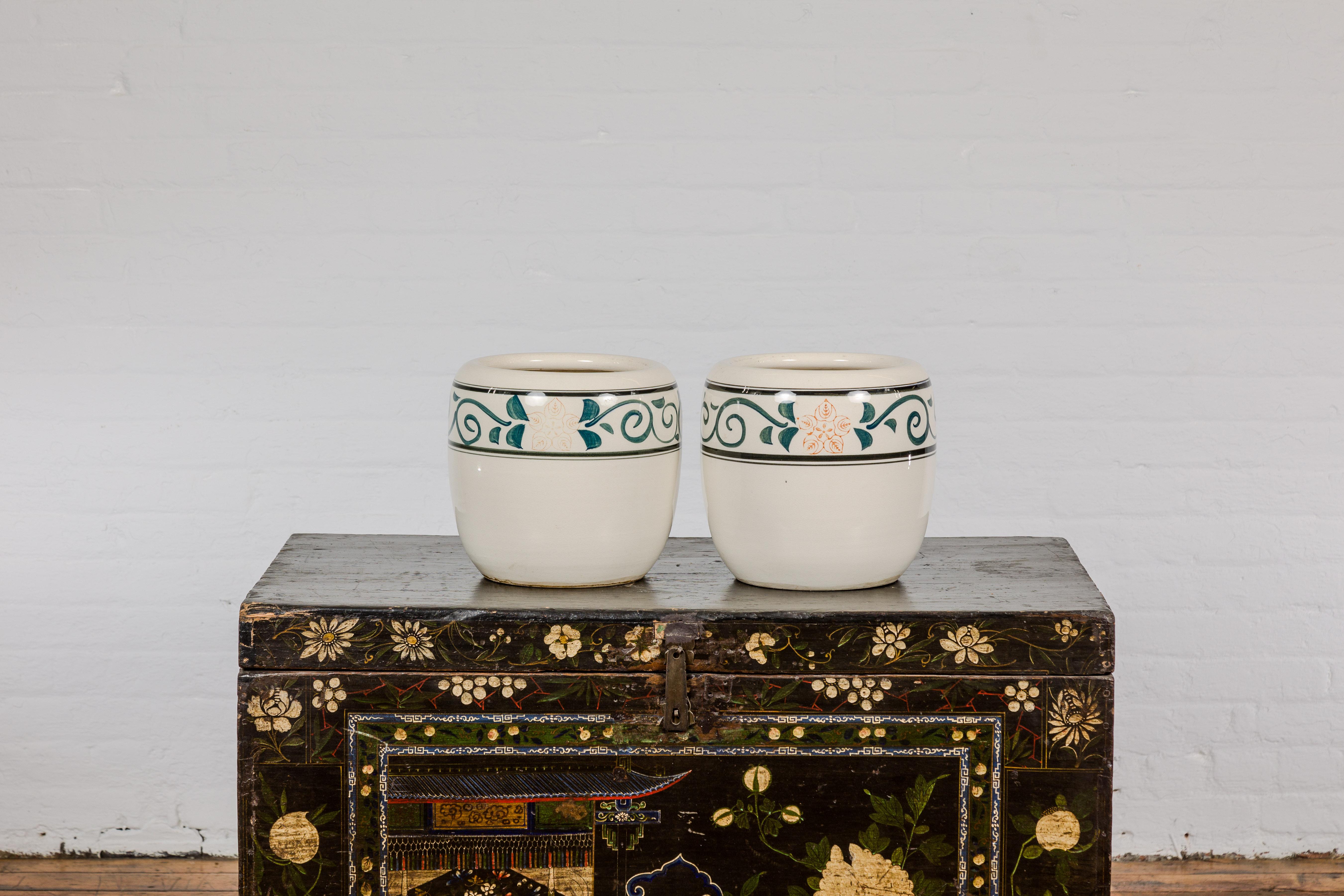 Glazed Pair of Late Qing Dynasty Ceramic Planters with Green Floral Décor For Sale