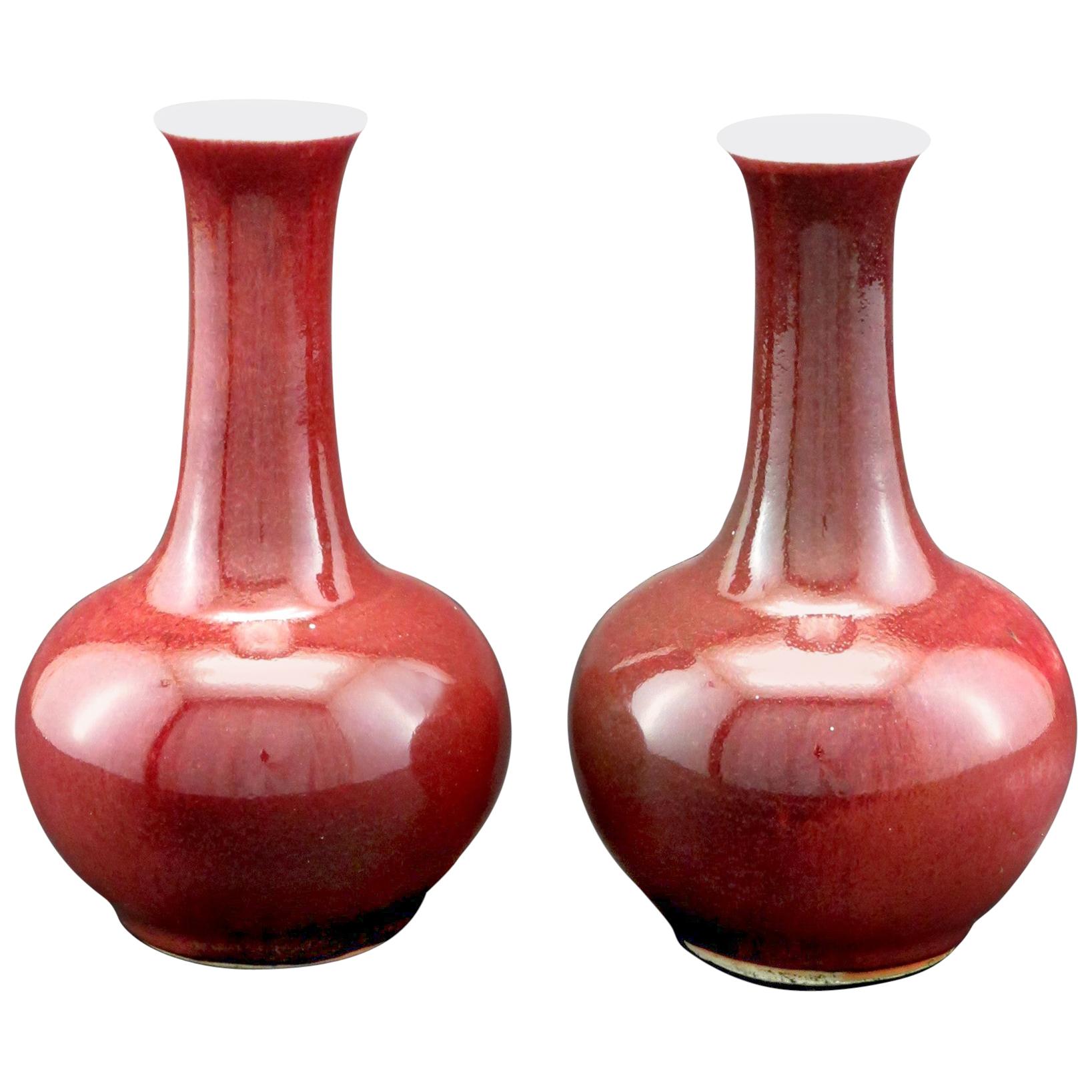 Pair of Late Qing Period Sang de Boeuf Porcelain Bottle Vases, China, circa 1900