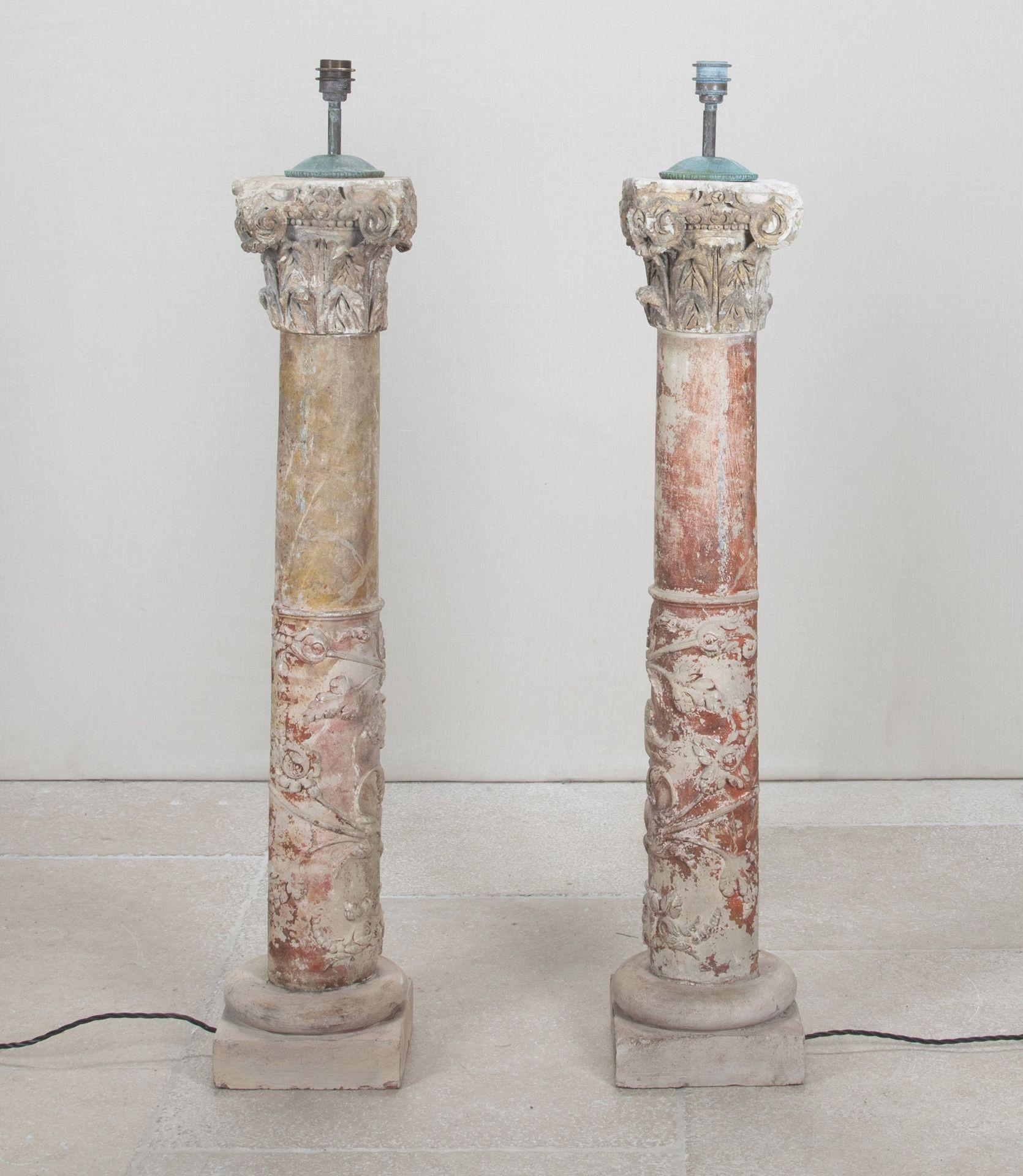 Pair of large late Renaissance period Italian stone columns converted into floor lamps.