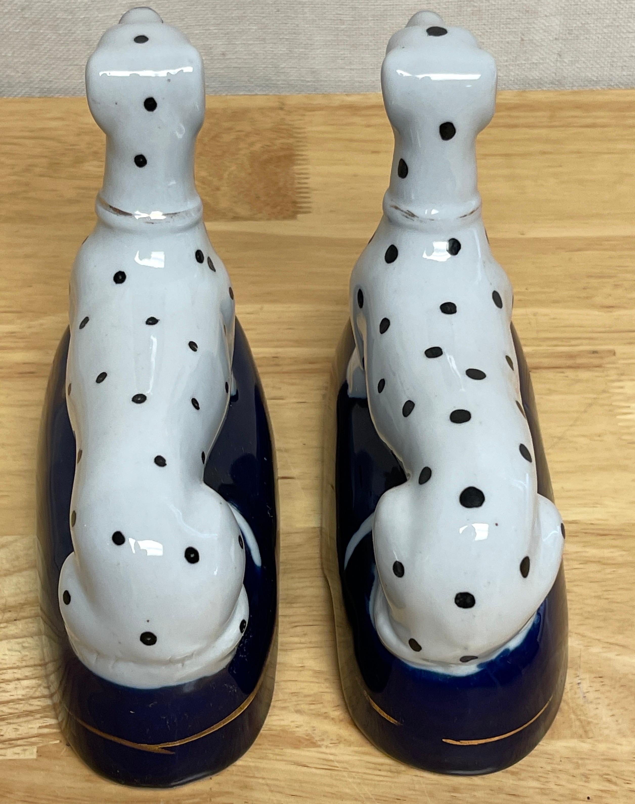 Enameled Pair of Late Staffordshire Recumbent Figures of Dalmatians For Sale