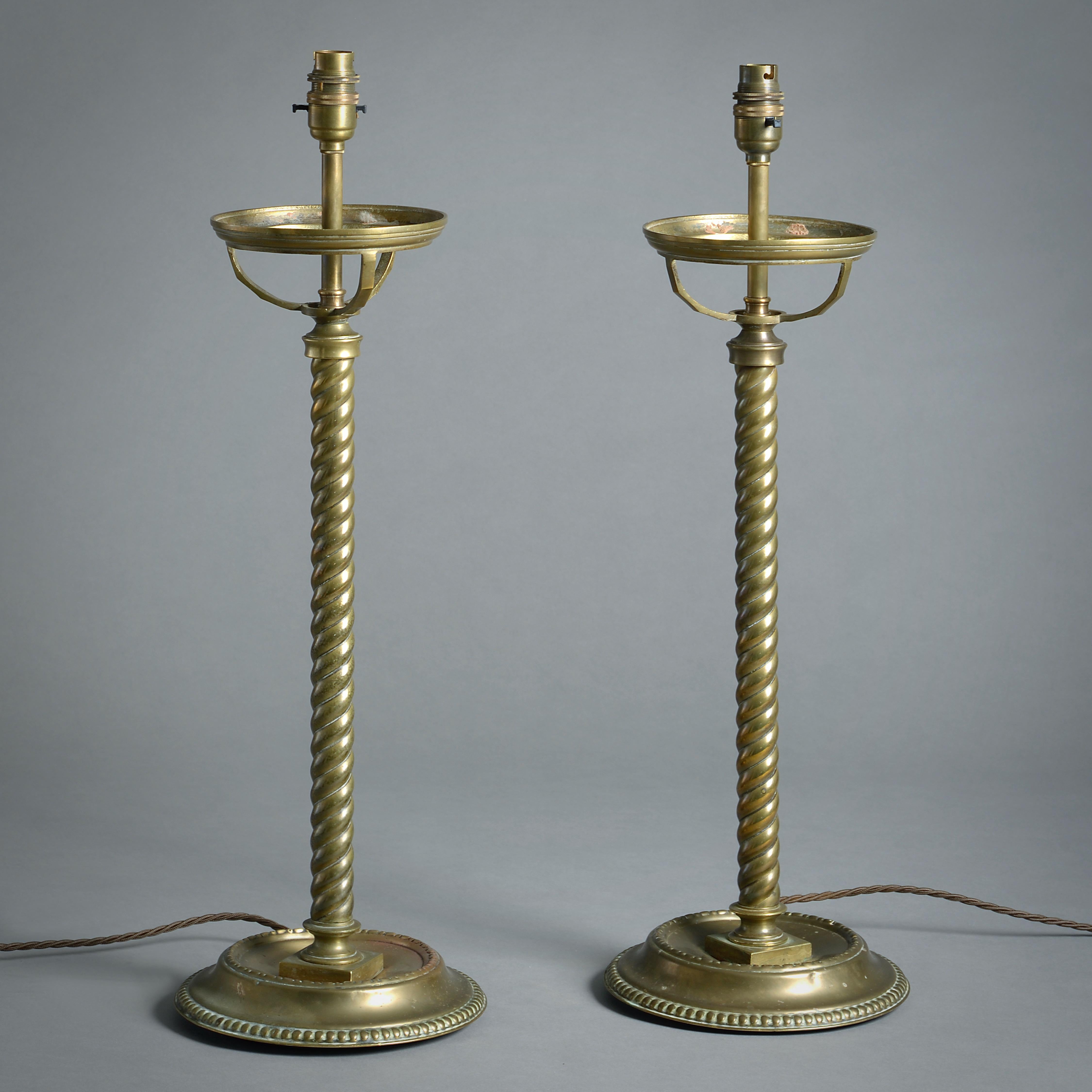 A PAIR OF LATE VICTORIAN BRASS SPIRAL COLUMN TABLE-LAMPS, CIRCA 1900.

19in. (48cm) high, exc. fitment