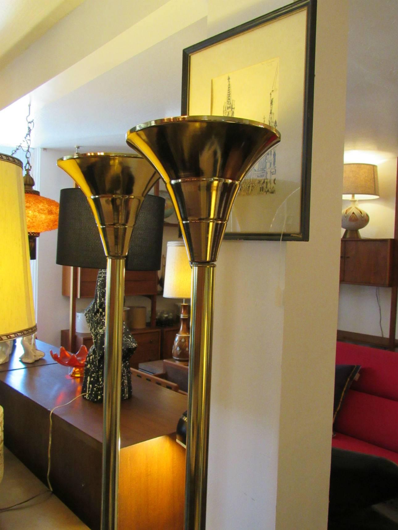 Pair of Brass Torchere floor lamps circa 1970s.   Slender and streamlined with a sleek, minimalist design.  