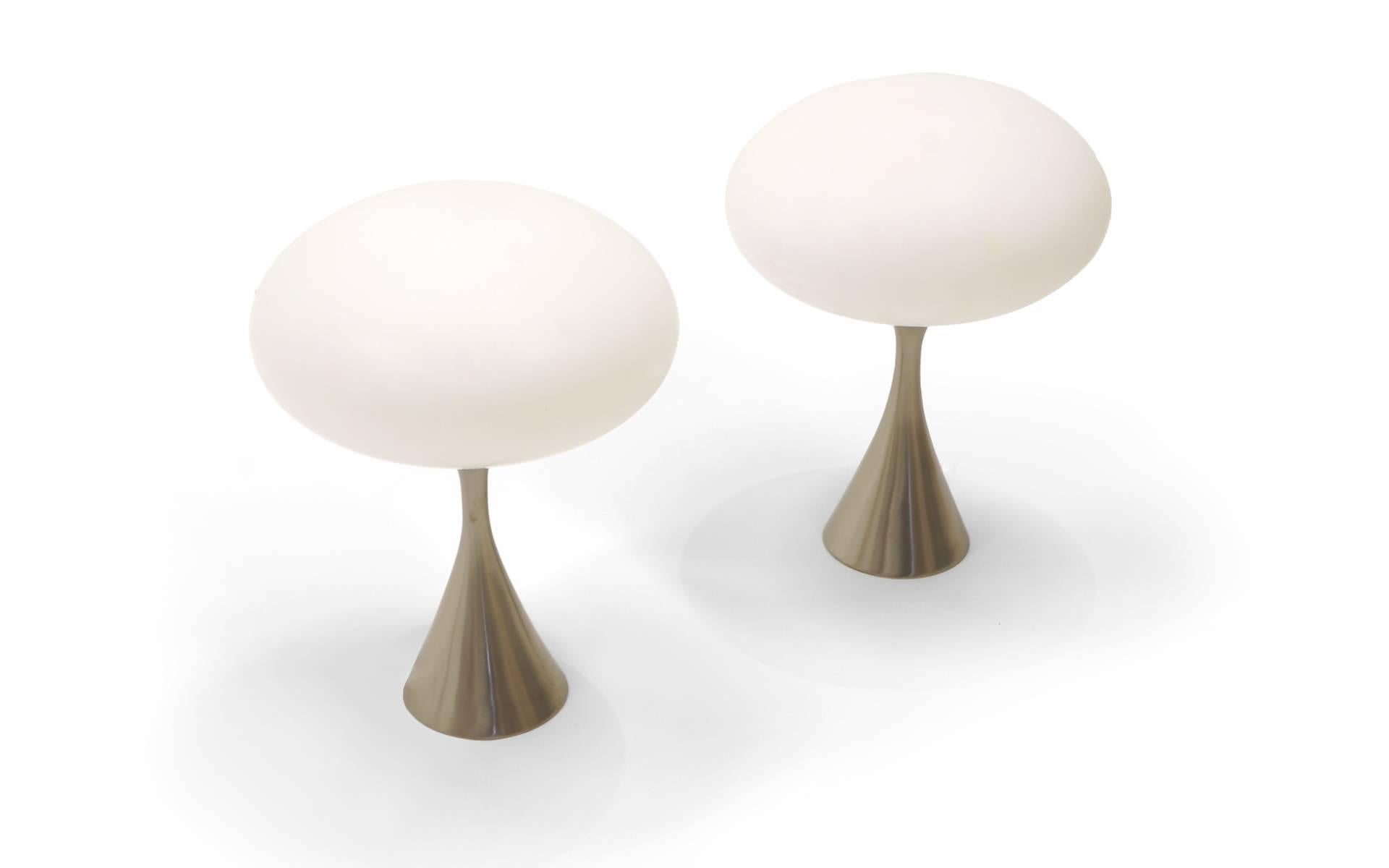 Pair of Laurel mod table lamps with original shades. Satin chrome tulip bases.
Base diameter is 5 inches.
