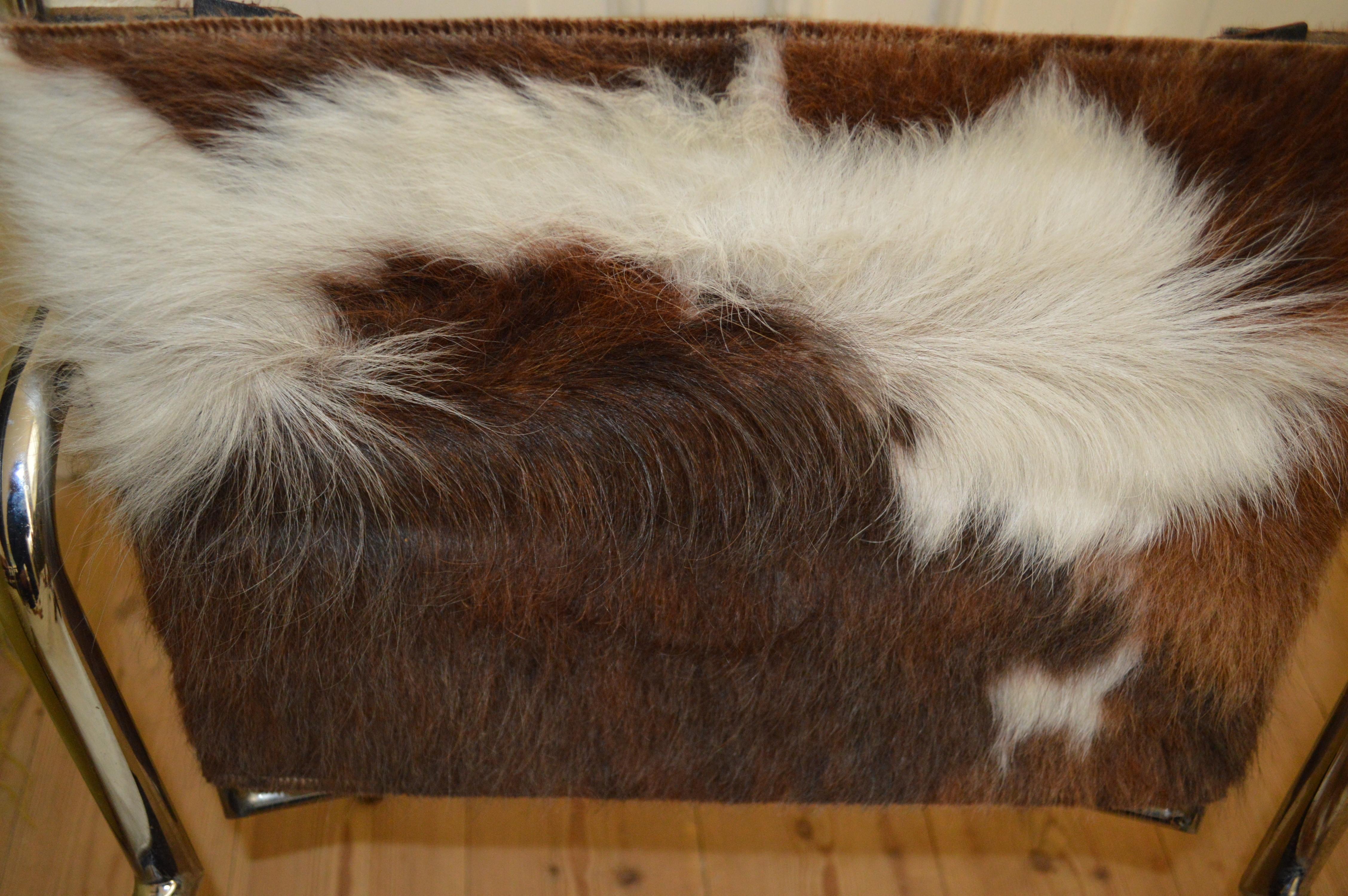 Late 20th Century Pair of LC1 Sling Chairs in Pony Skin.