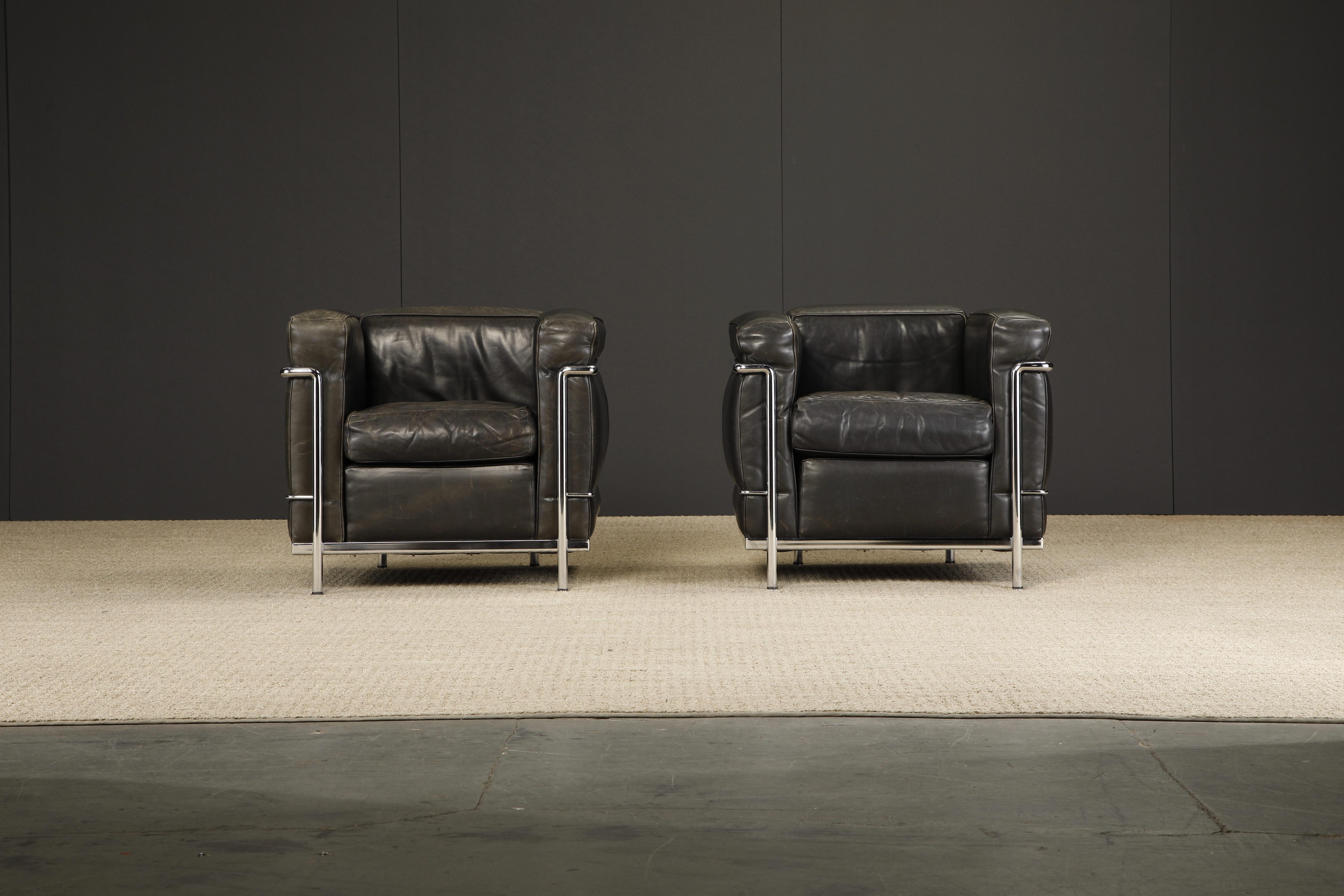 This incredibly comfortable pair of Le Corbusier for Cassina 'LC2' club chairs (authentic signed examples, see pics) in gorgeous thick Italian black leather are in beautiful vintage condition with attractive naturally aged leather patina and ready