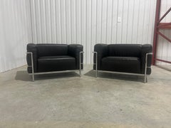 Pair of 'LC3' Black Leather Club Chairs by Le Corbusier for Cassina, Signed
