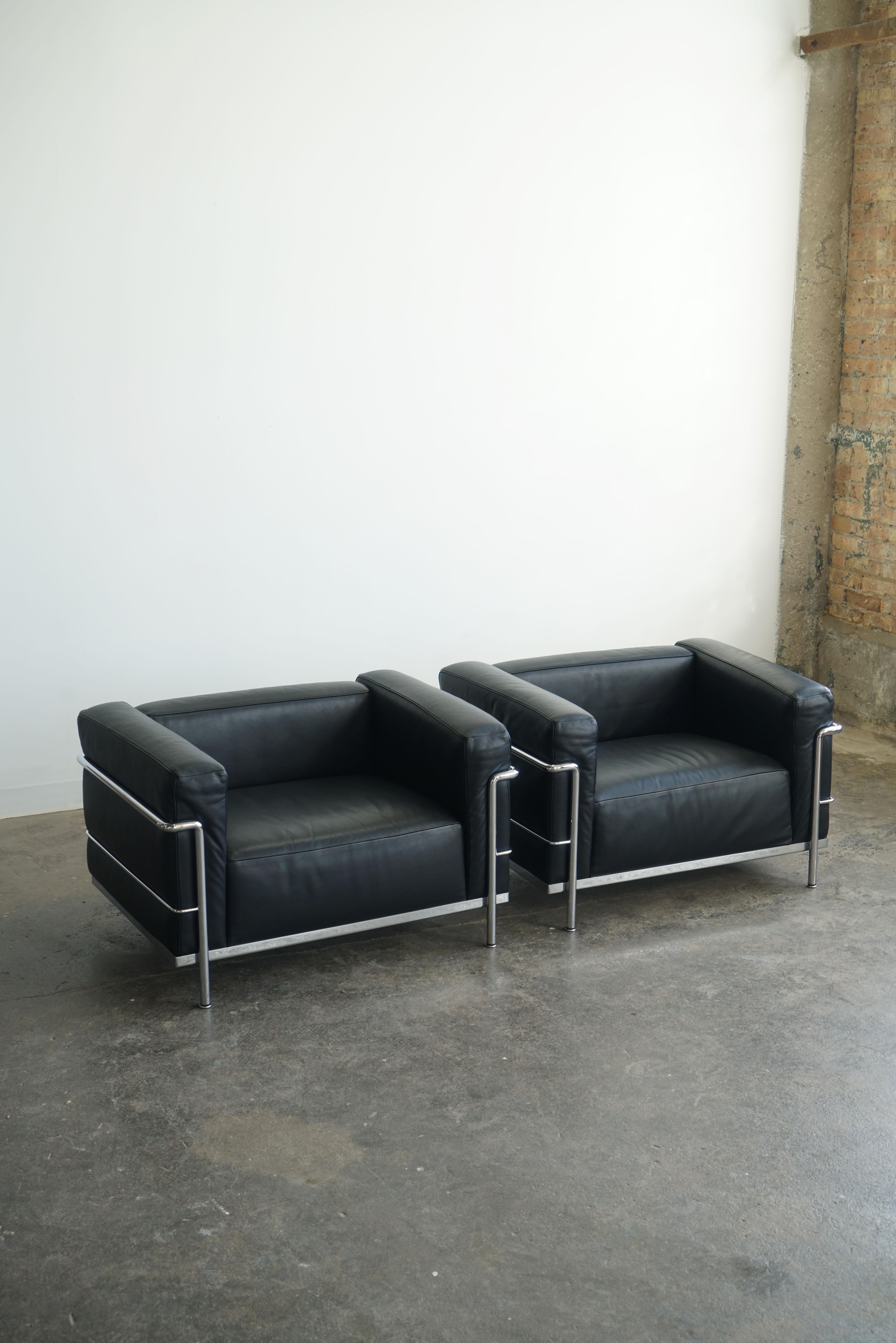 Pair of LC3 Grand Modele Armchairs for Cassina.
Black leather and chrome plated steel.
Newest production.
This pair has had very little use. 

One of the most iconic chairs, the LC3 was designed in 1928 by Le Corbusier, Pierre Jeanneret, and