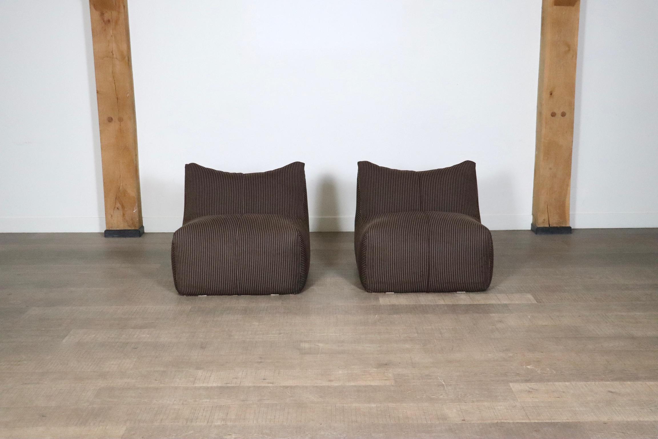 Beautiful pair of “Le Bambole” modular sofa elements designed by Mario Bellini for B & B Italia in the 1970s. This beautiful edition comes in its original high quality brown pinstripe fabric. These elements can also be hooked together by metal